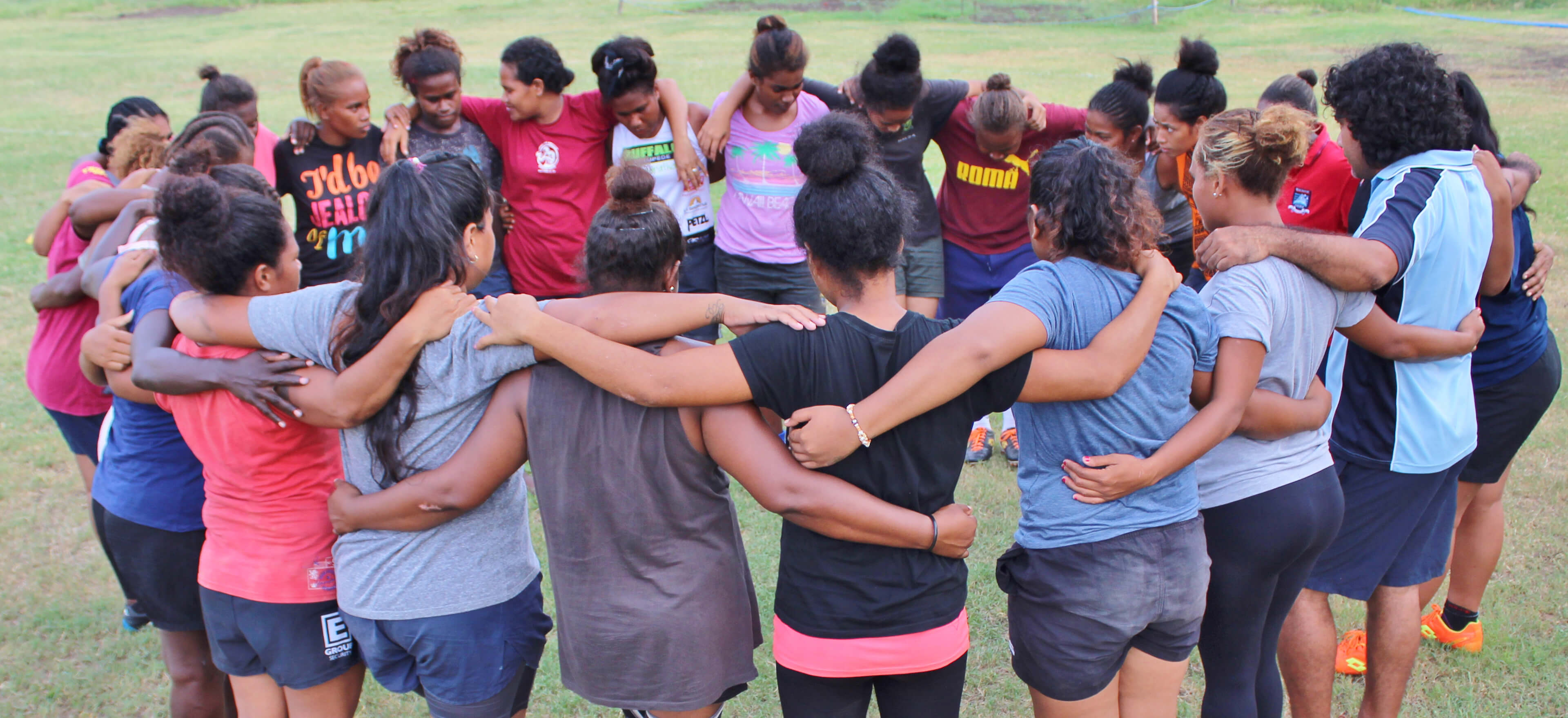 athletes hugging