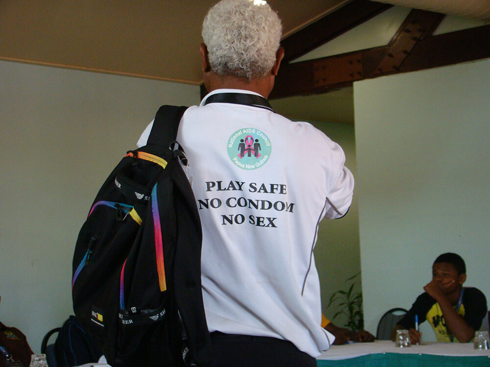Community members playing hockey in Papua New Guinea