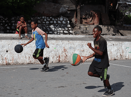 Boys play basketball 