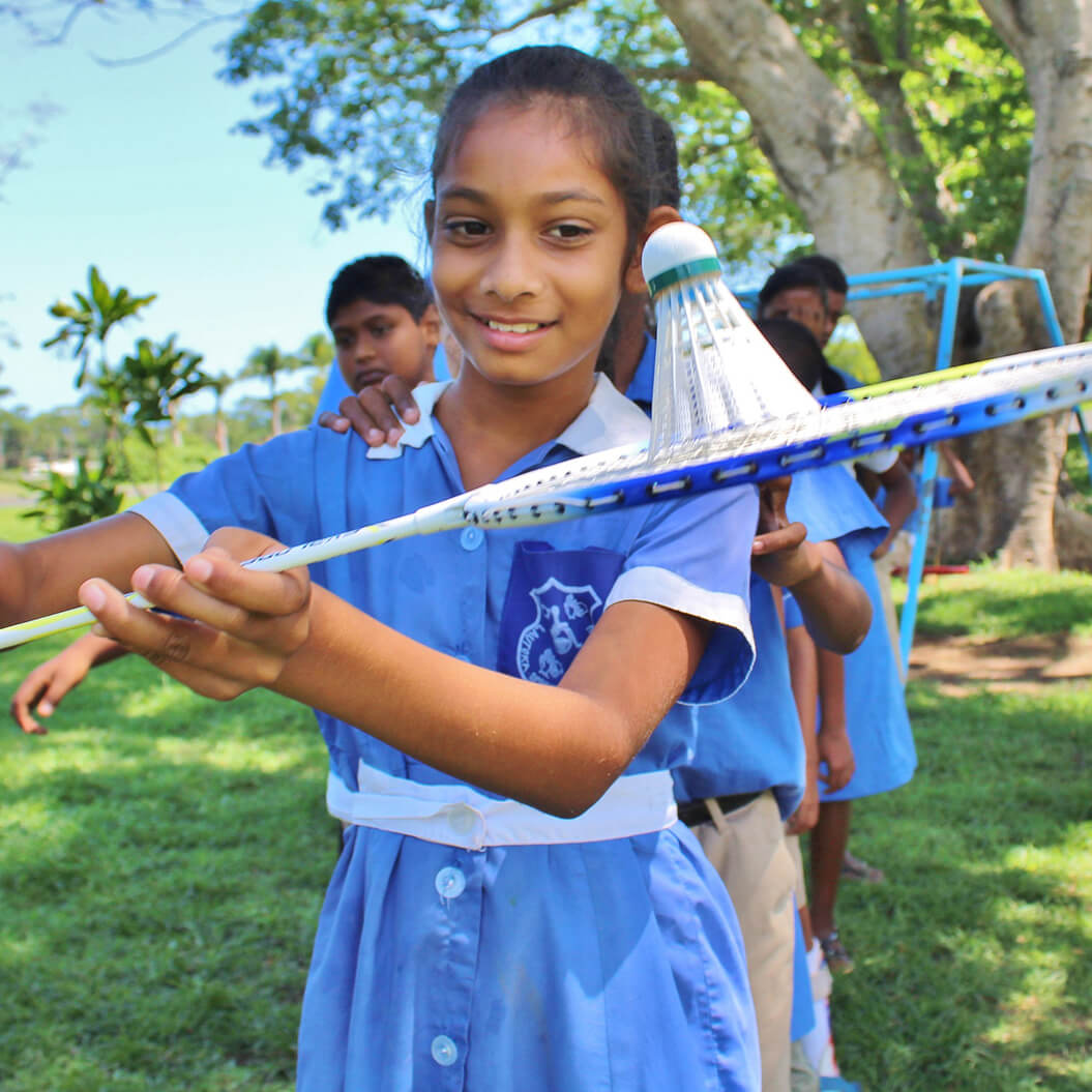 girl practicing badminton