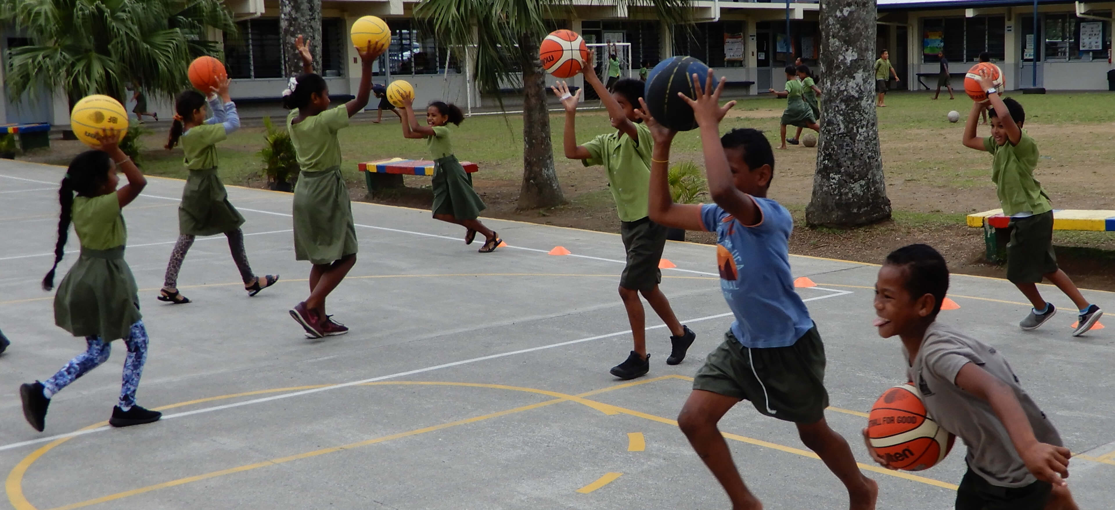 Fijian kids playing basketball