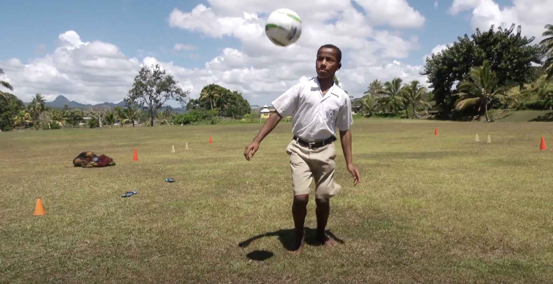 boy playing football