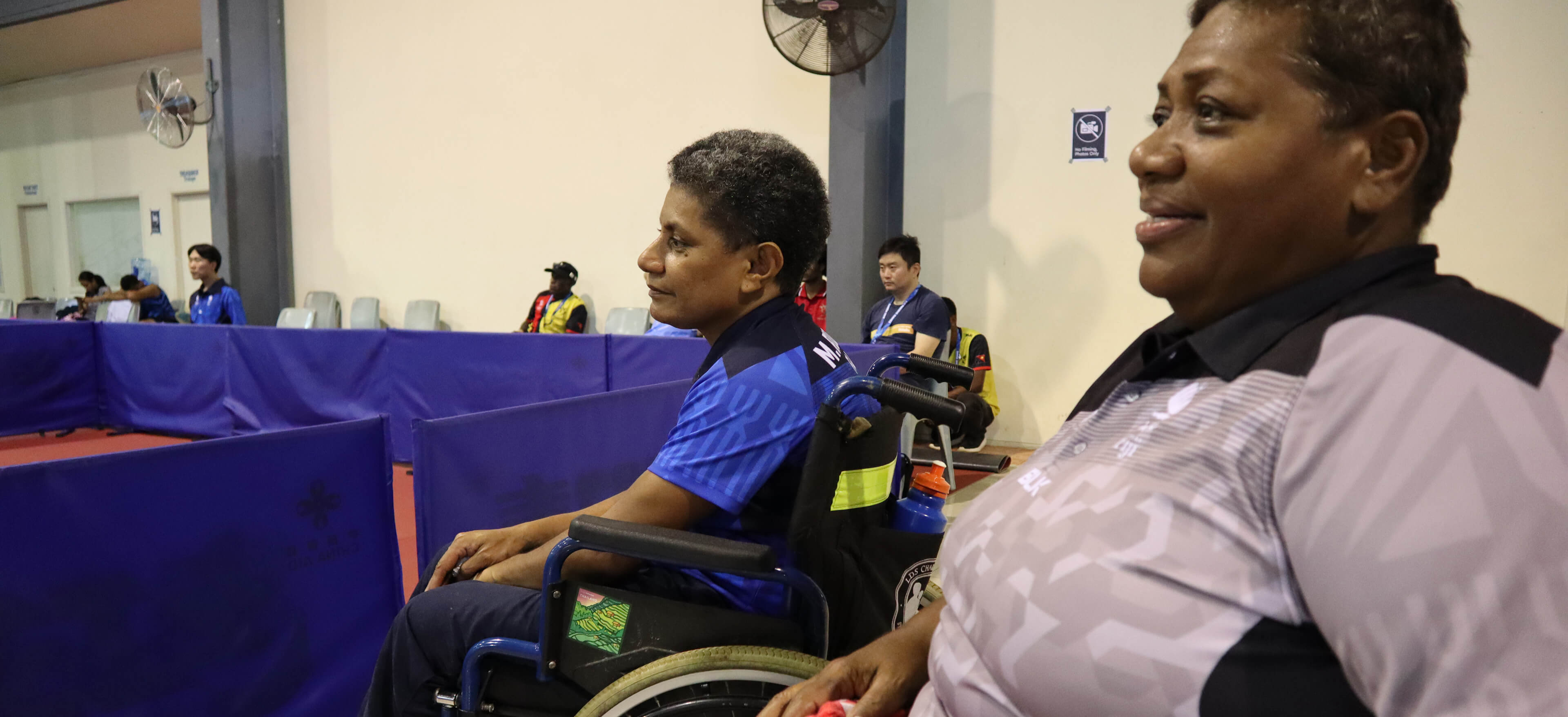 Two women in wheelchairs