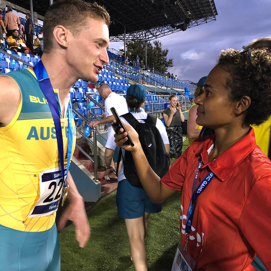 Journalist Melissa Fare interviewing athlete Steve Solomon