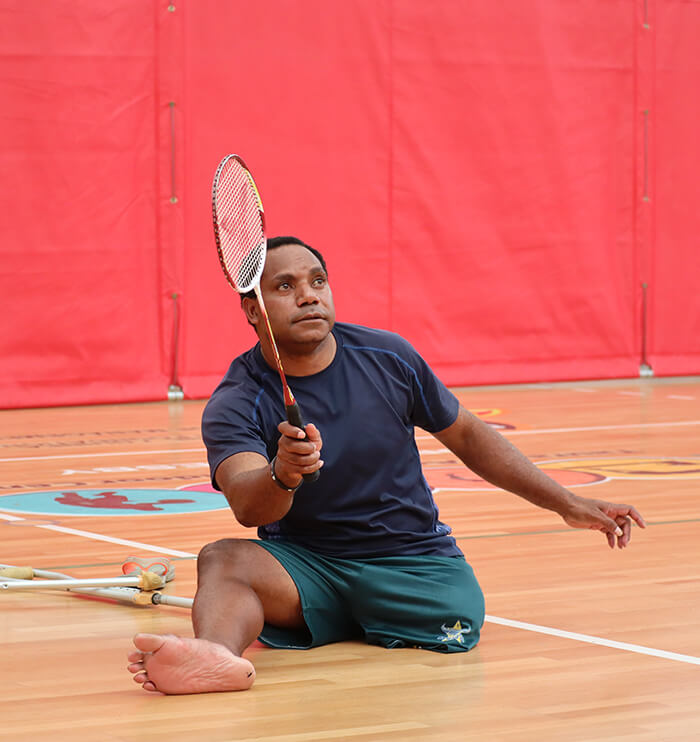 Disabled athlete playing badminton