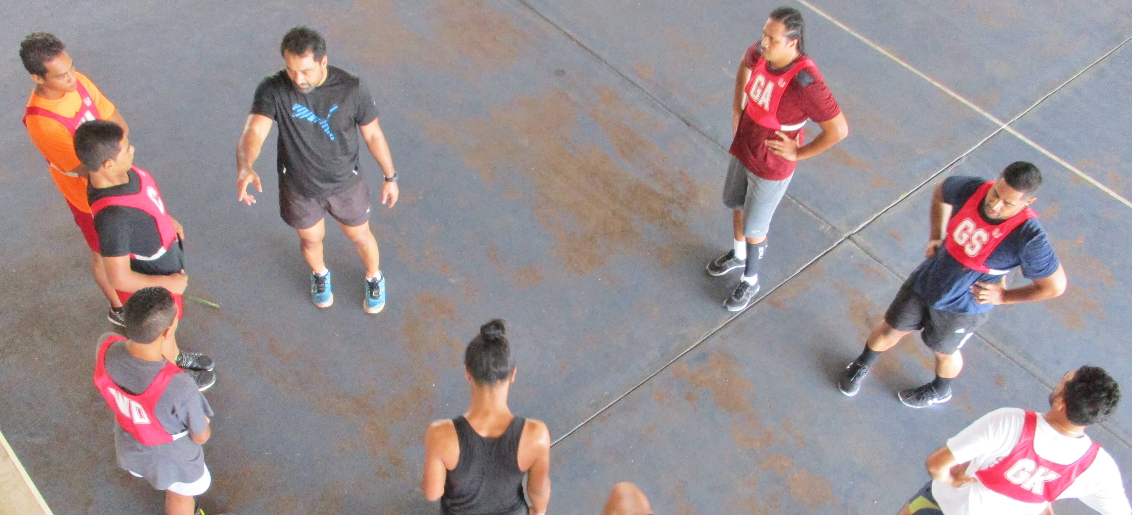 People standing in a sports court