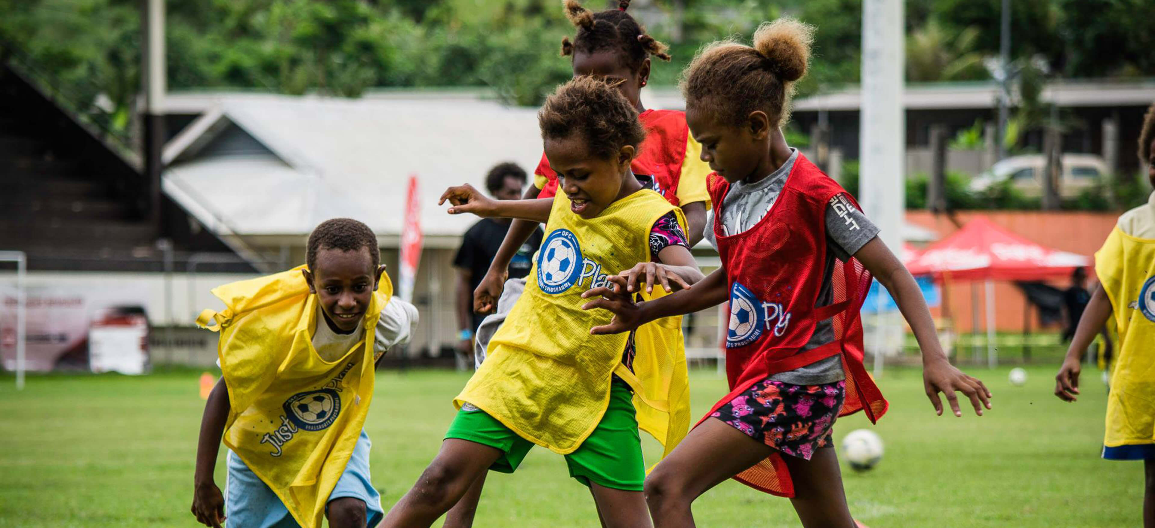 Kids in Vanuatu play football