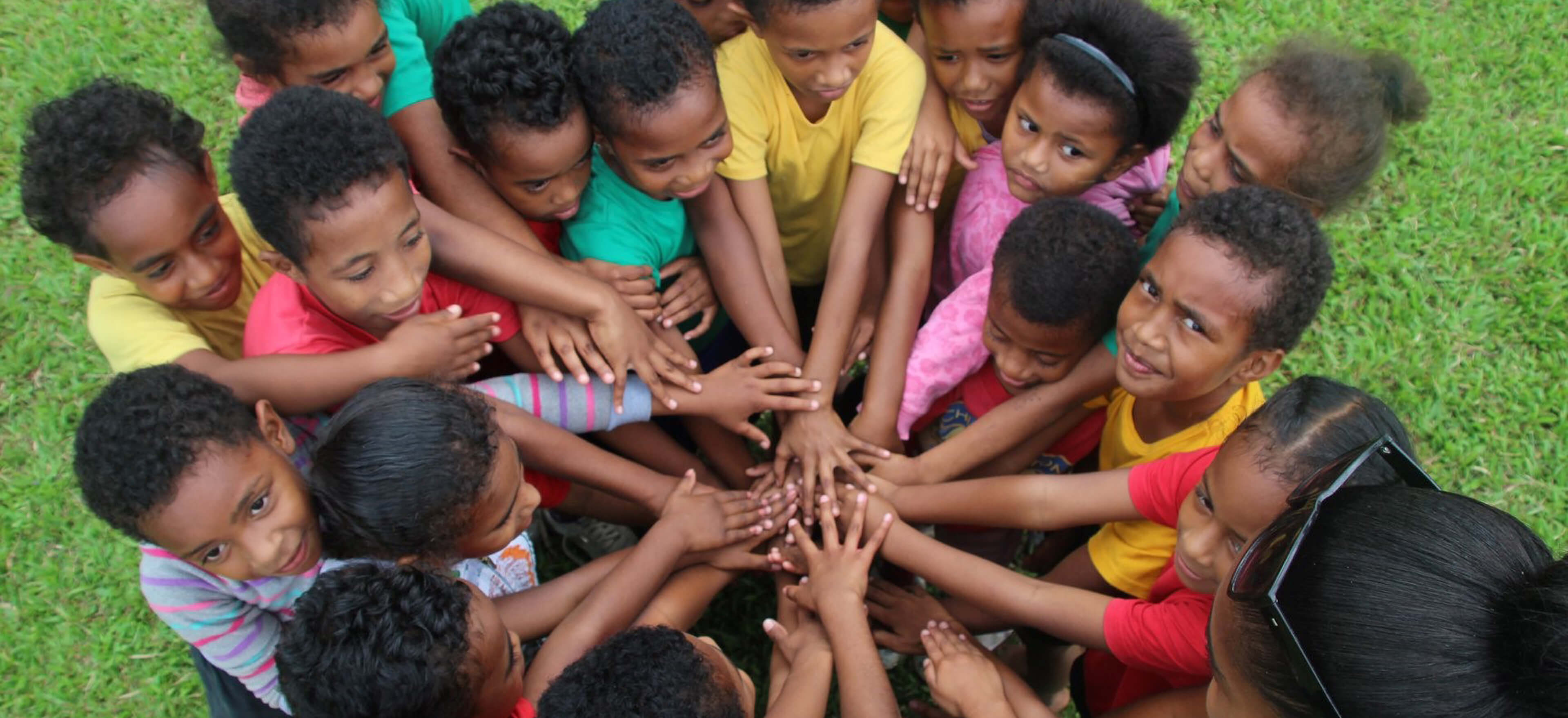 Young league players join hands