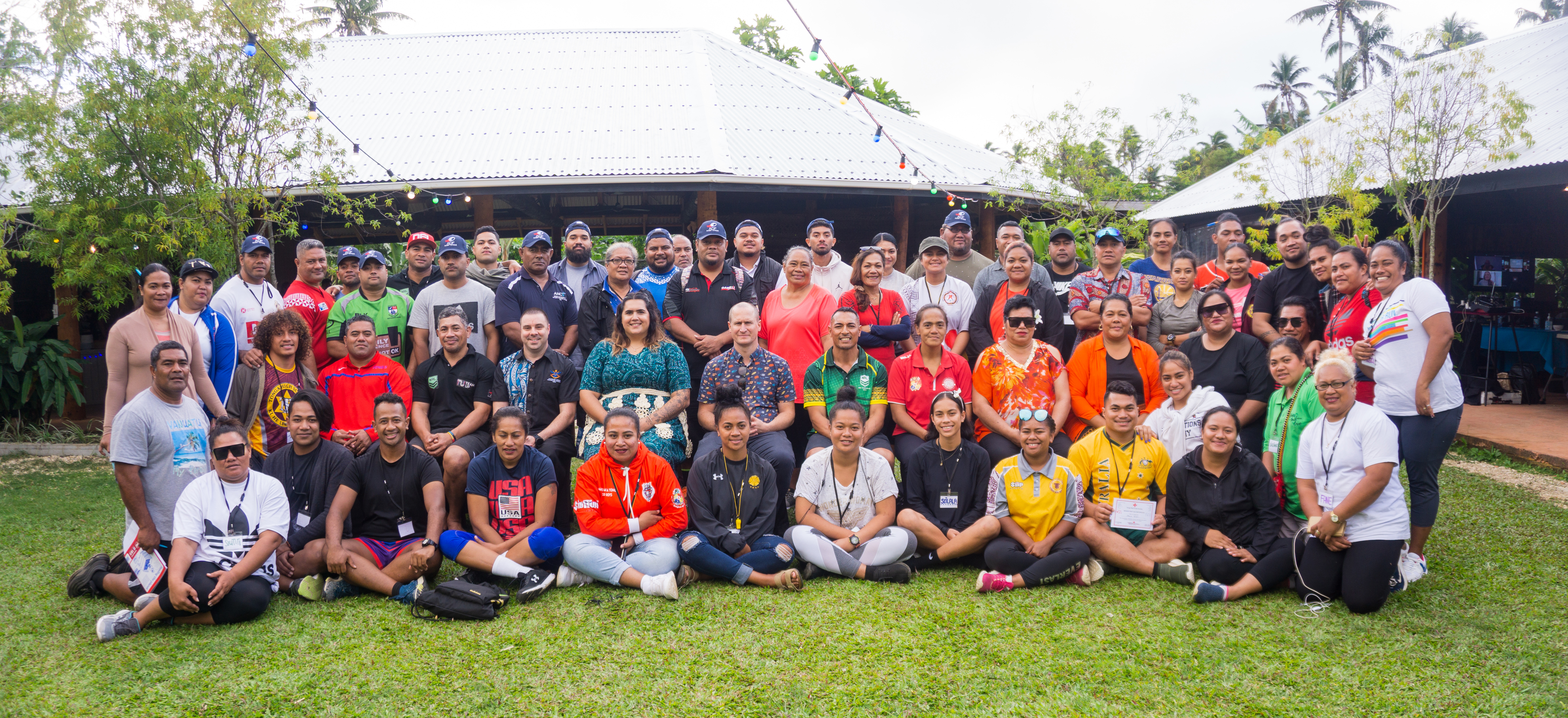 A group of people in Tonga smiling for a photo