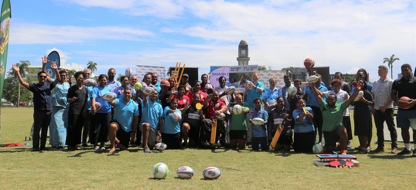 Sports staff in Fiji posing for a group photo
