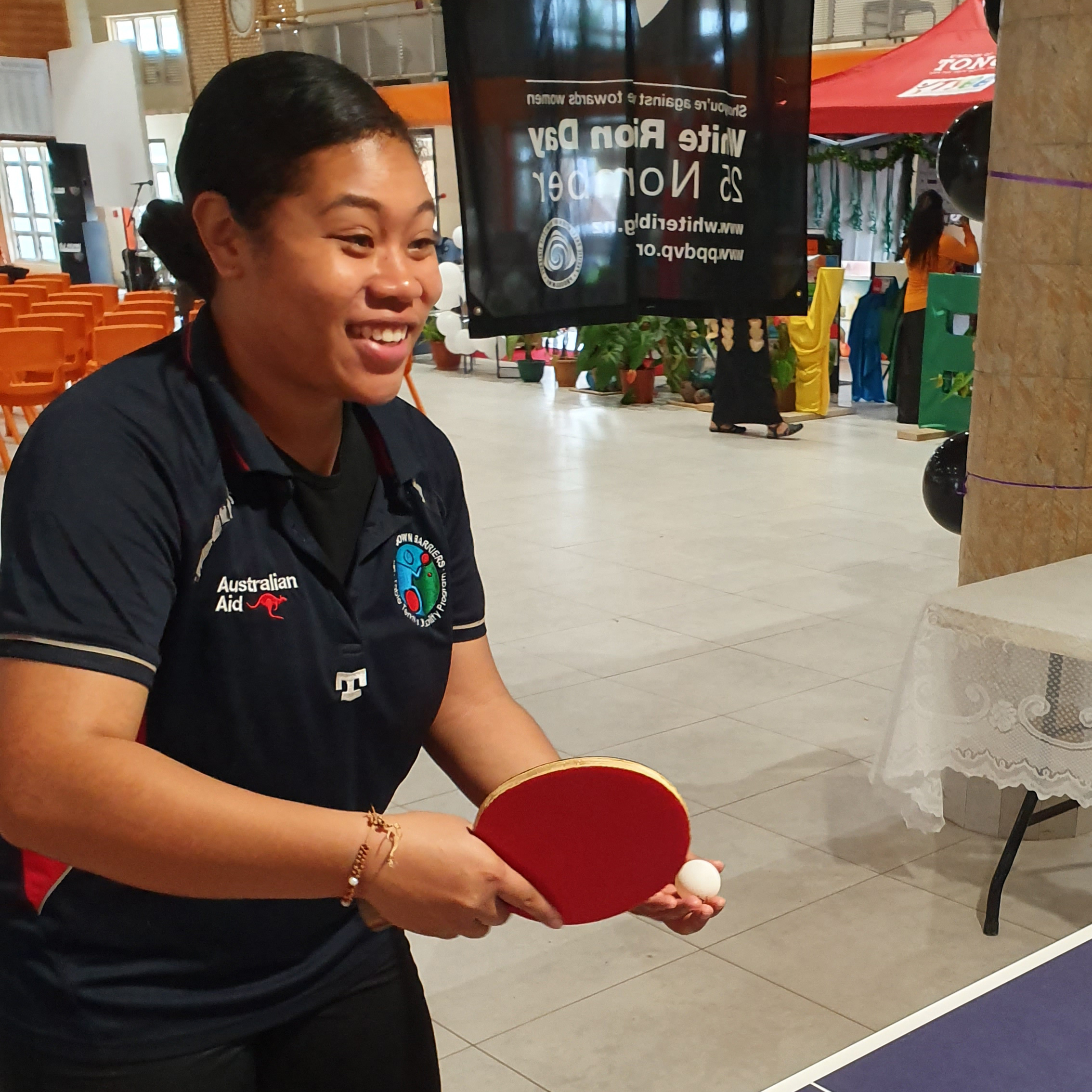 A woman in Tonga playing table tennis
