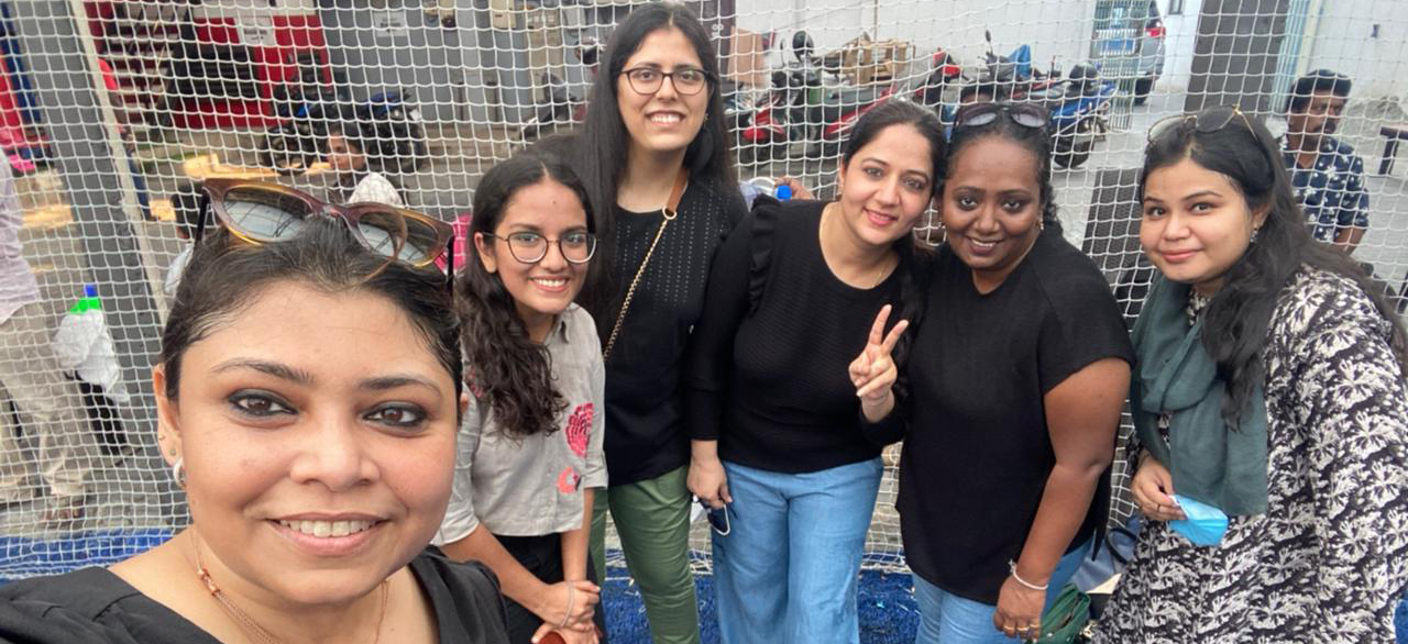 Female journalists in India pose for a selfie