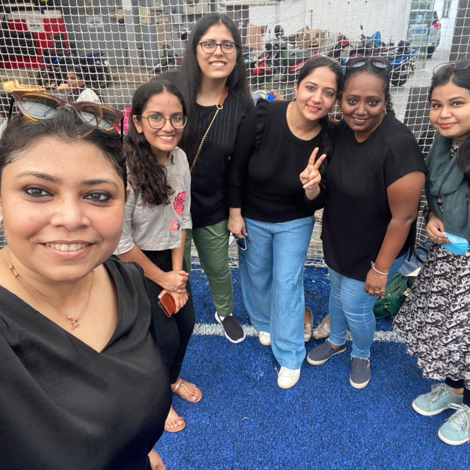 Female journalists in India pose for a selfie