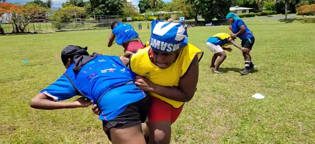 Girls in Fiji playing rugby union