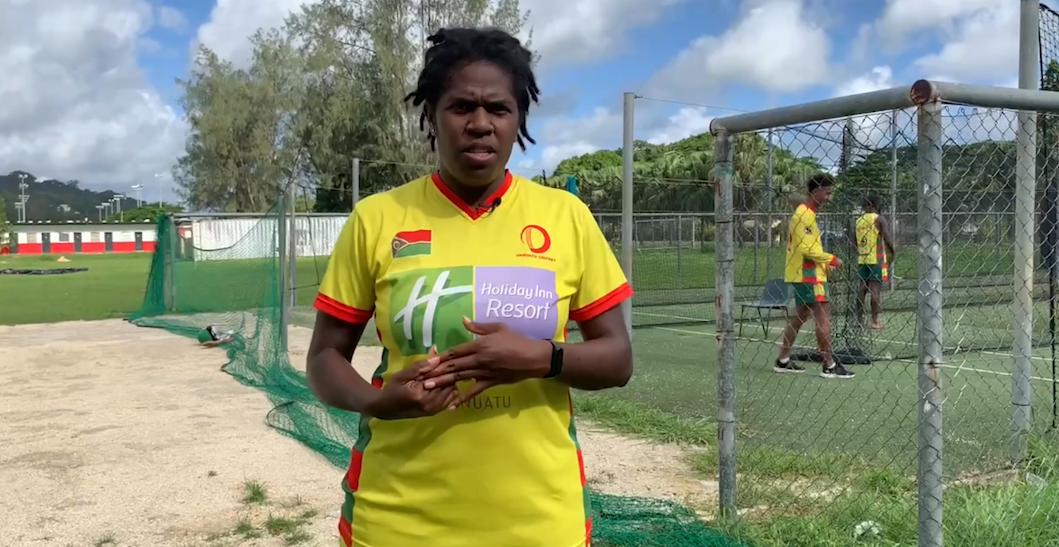 A female cricket player in Vanuatu speaking to camera