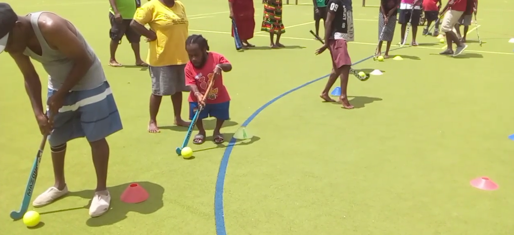 People in Vanuatu playing hockey