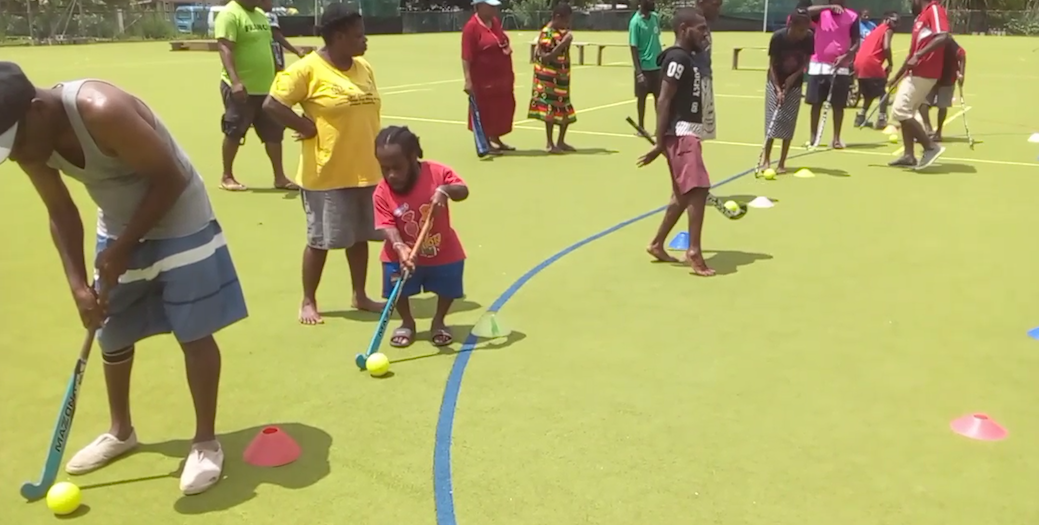 People in Vanuatu playing hockey