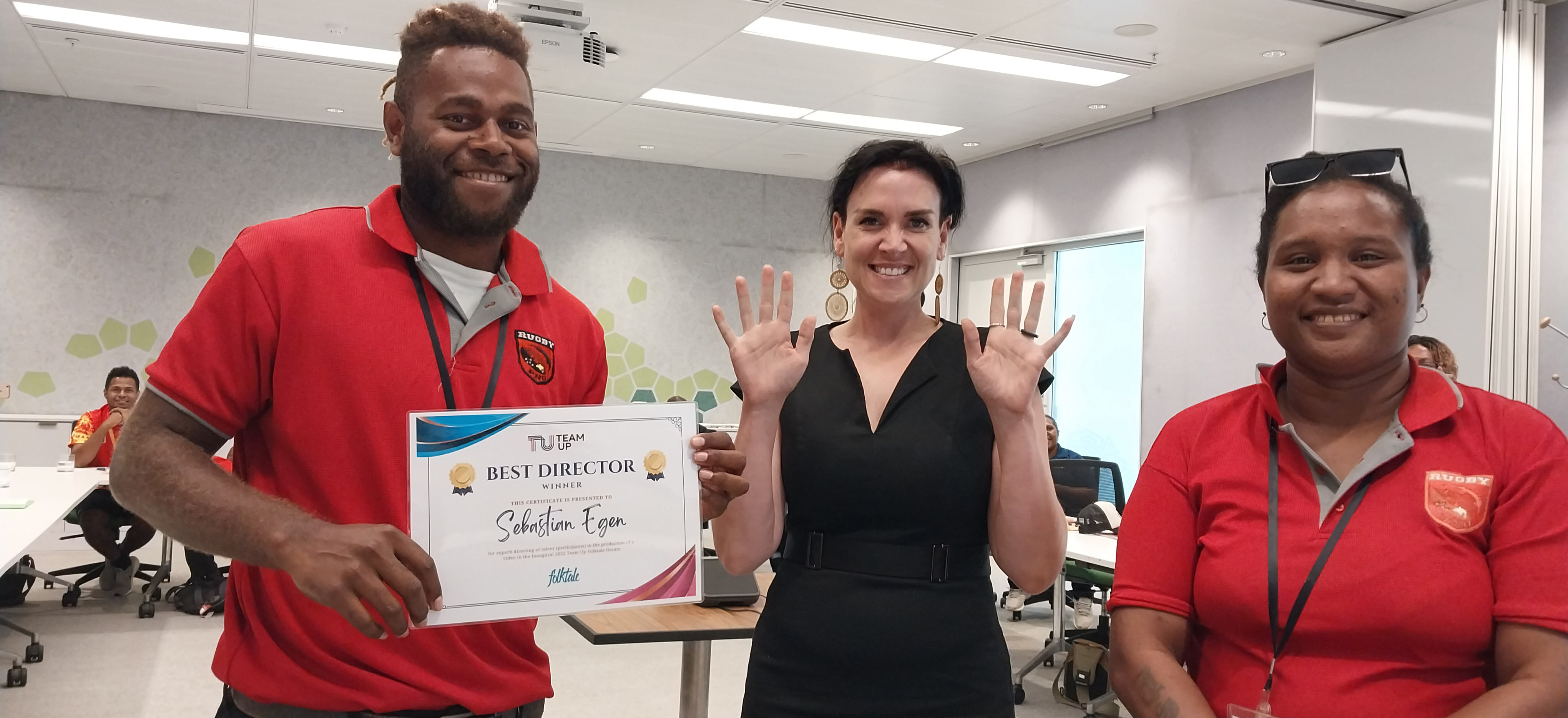 People in Papua New Guinea holding a certificate