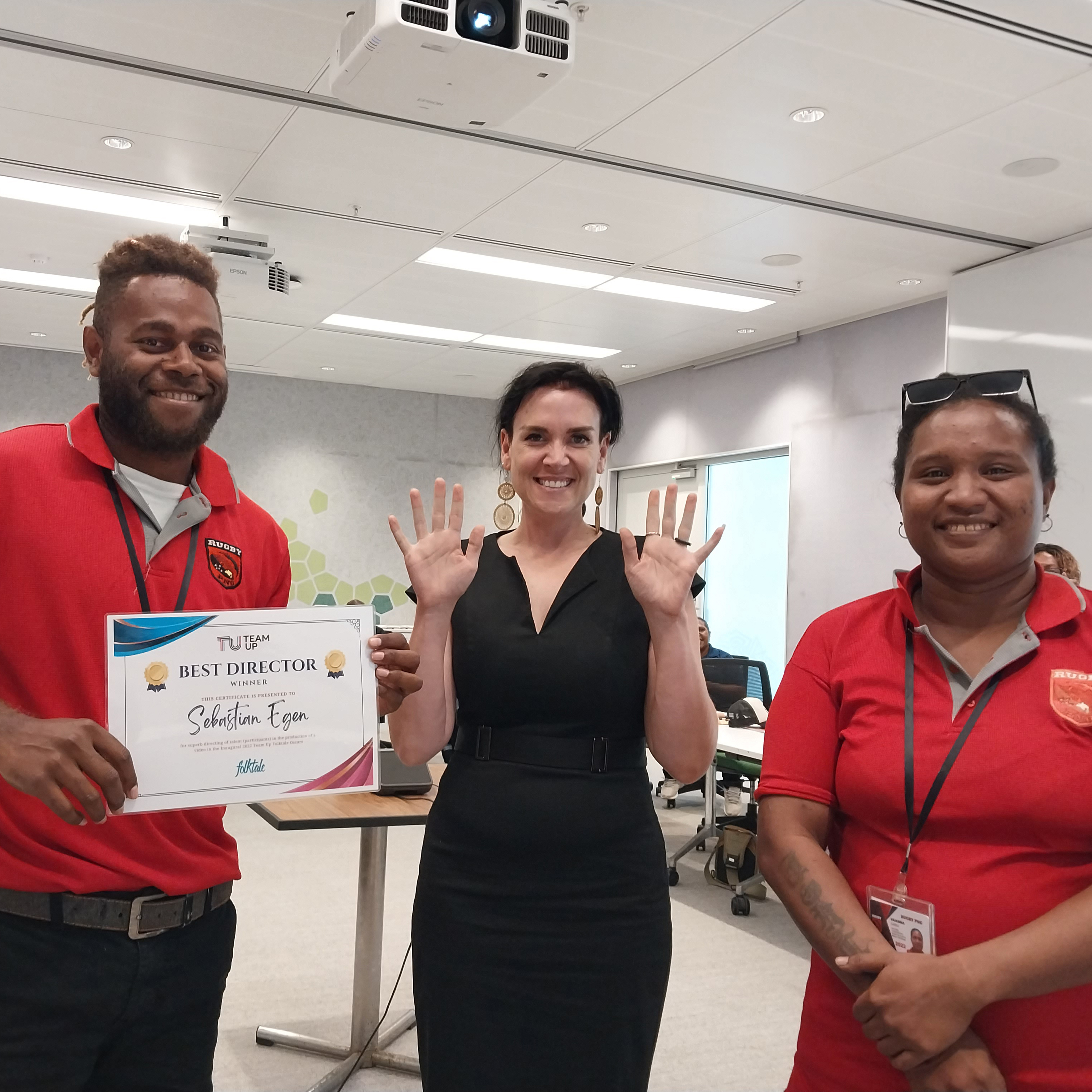 People in Papua New Guinea holding a certificate