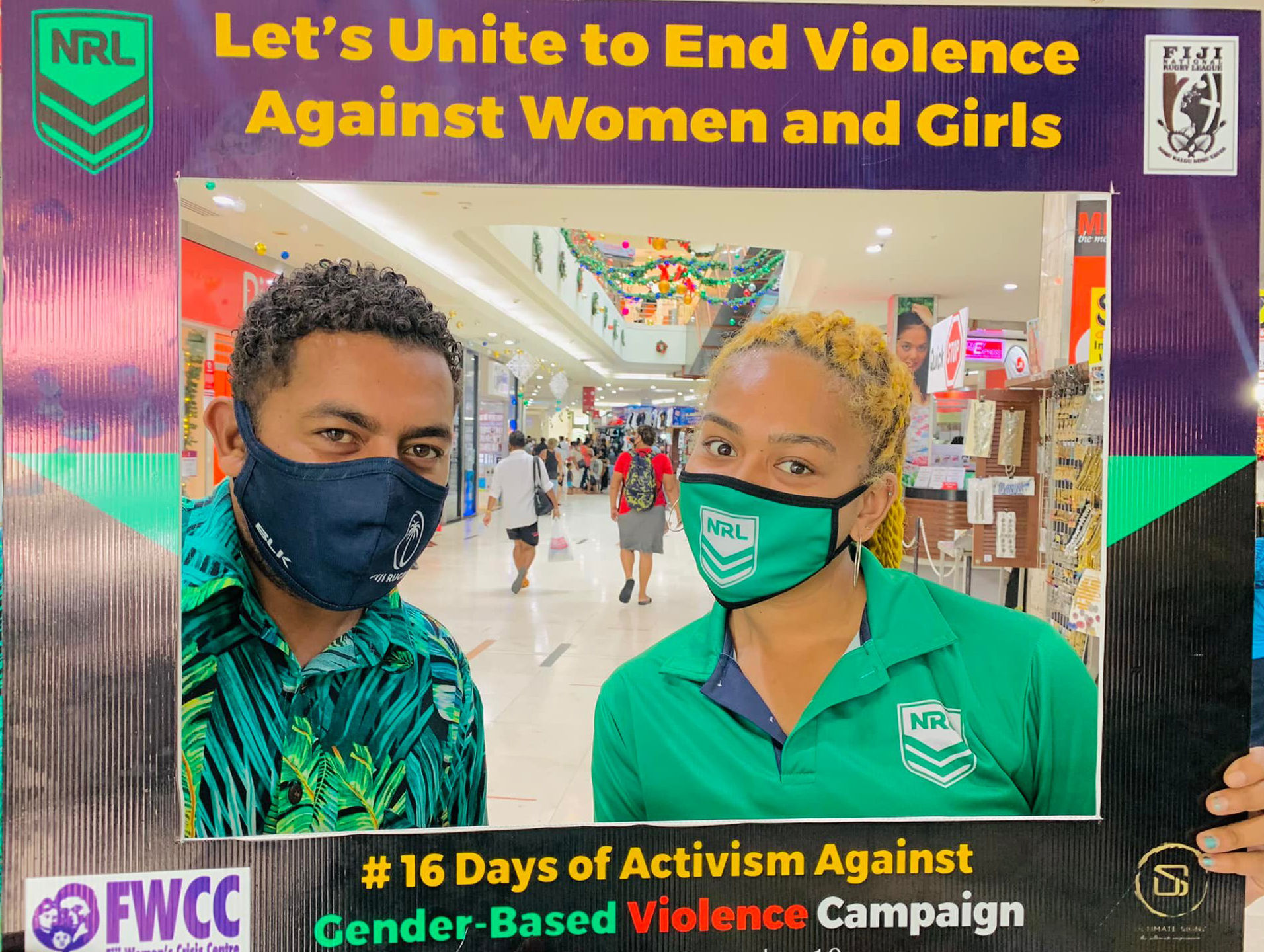 Two people in Fiji posing for a photo 