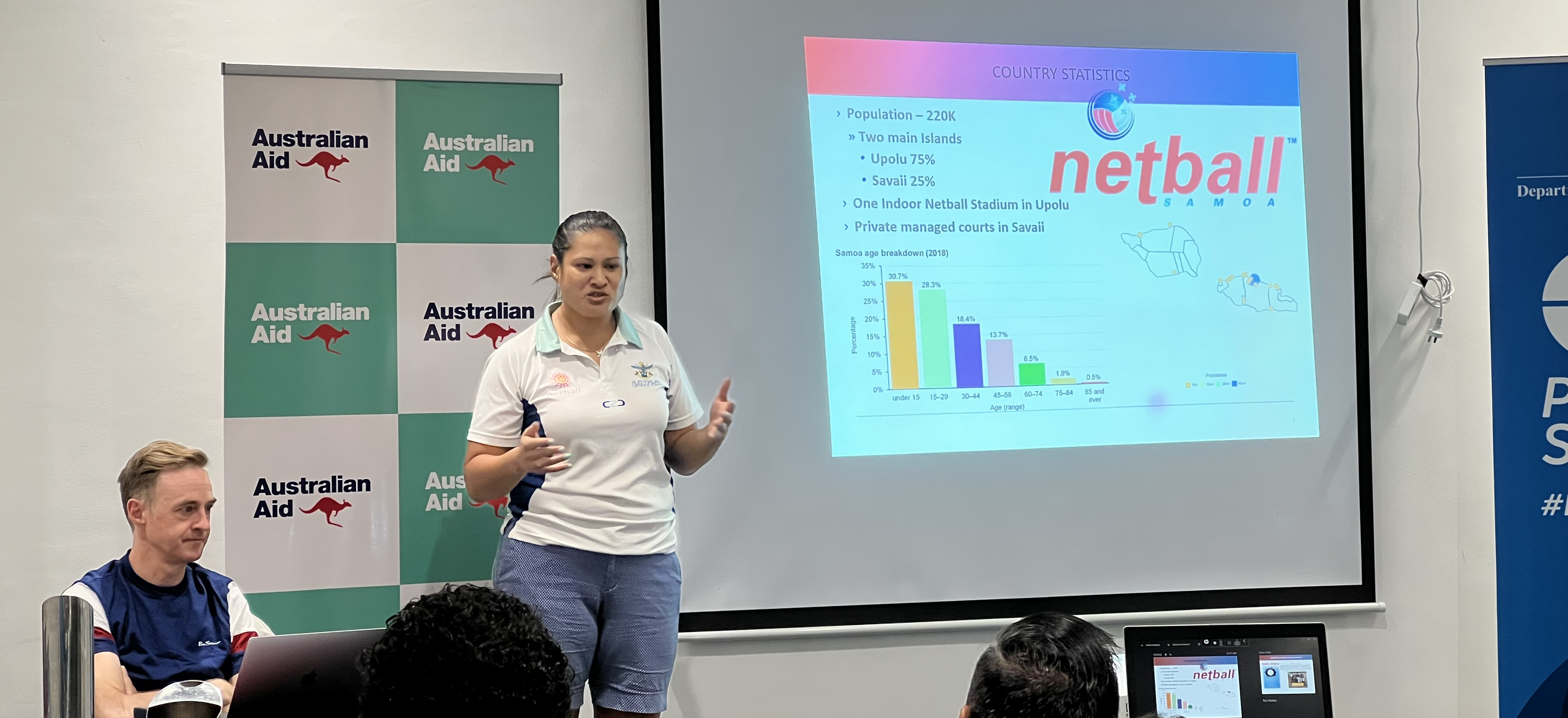 A woman in Samoa speaking during a workshop