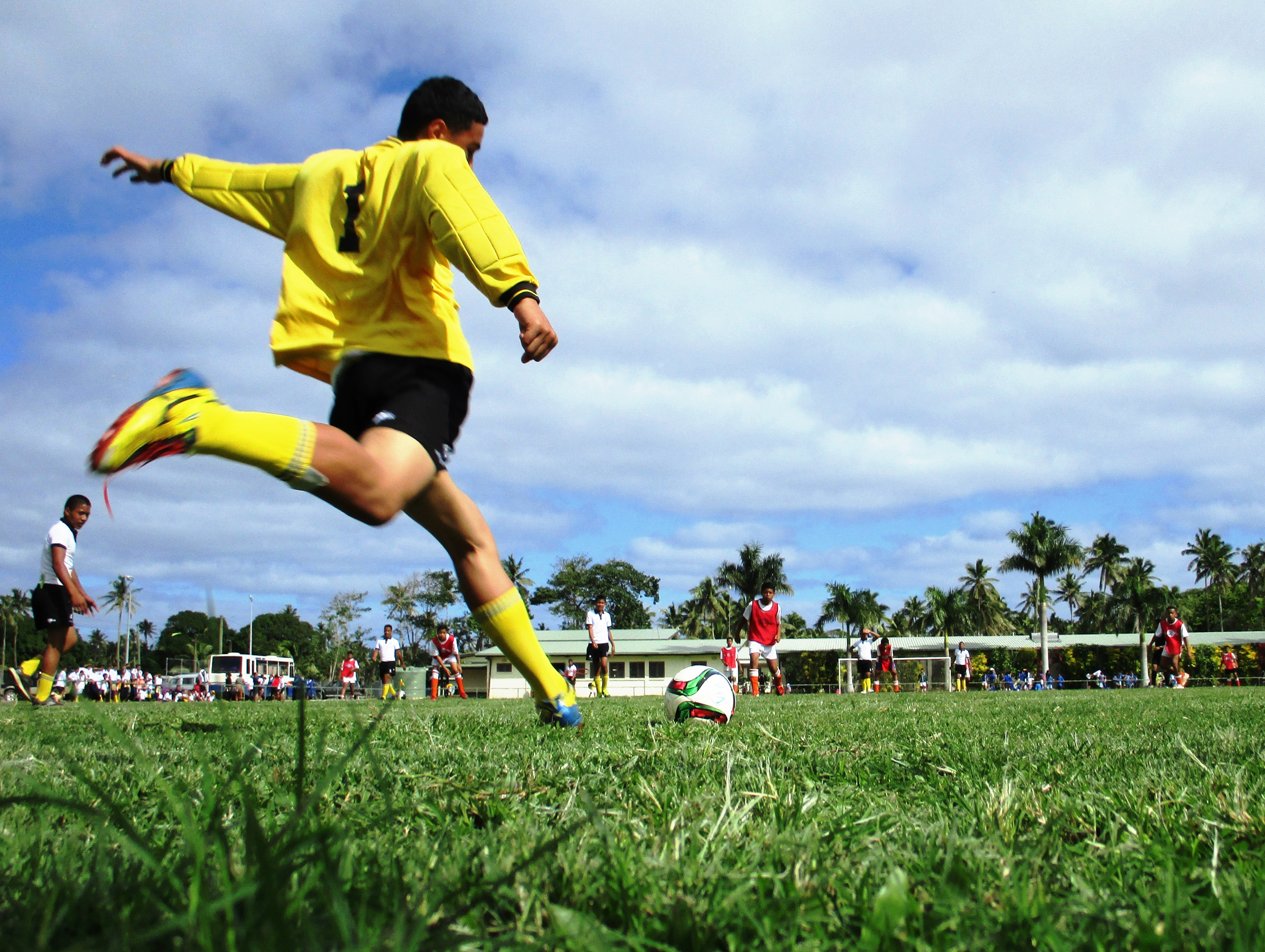 Boys playing football in Fiji 