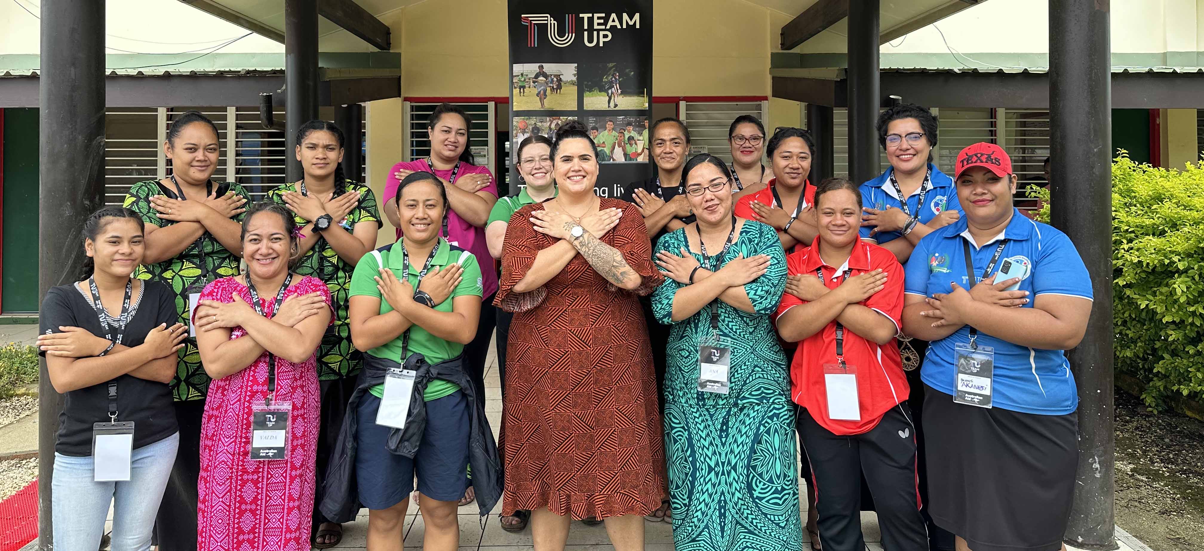 Women in Tonga posing for an International Women's Day photo