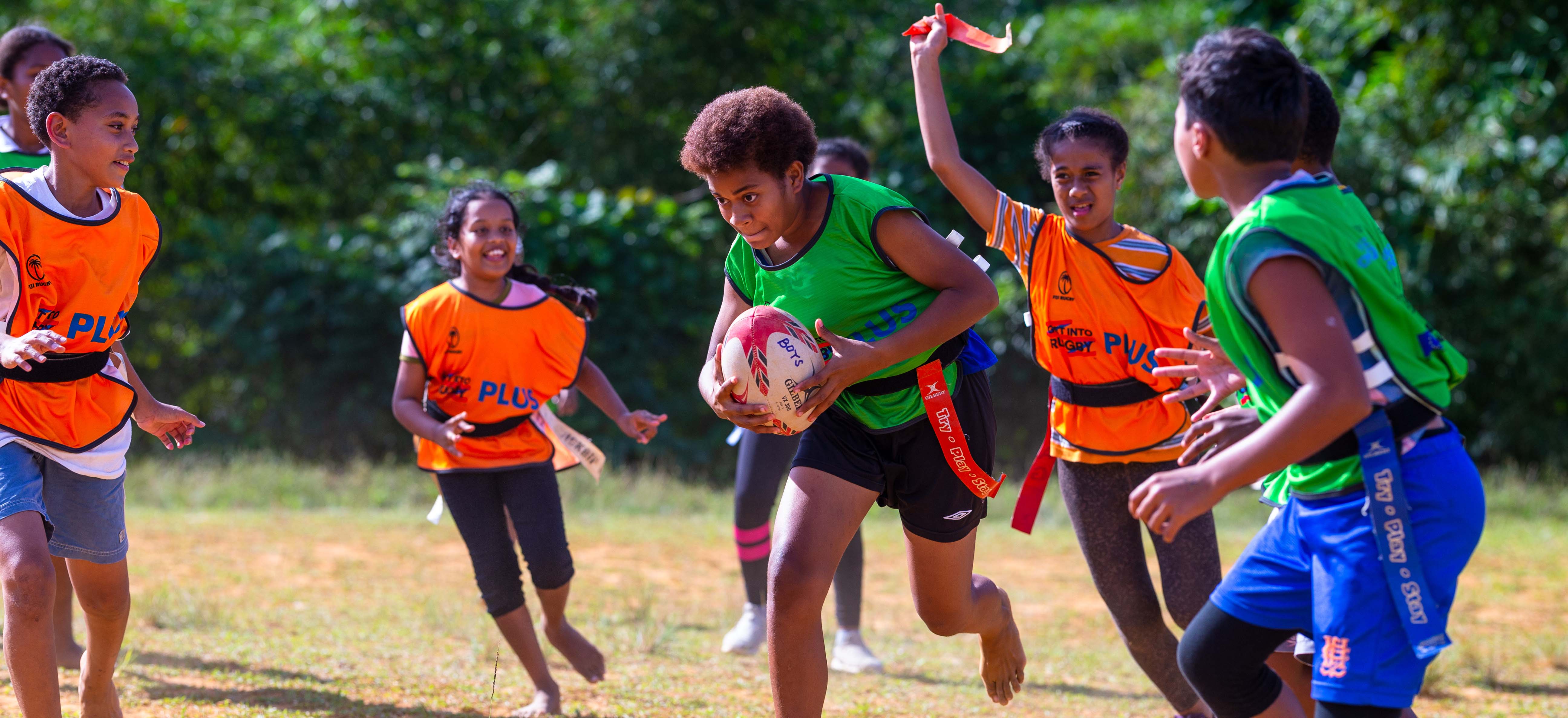 Girls in Fiji playing rugby union