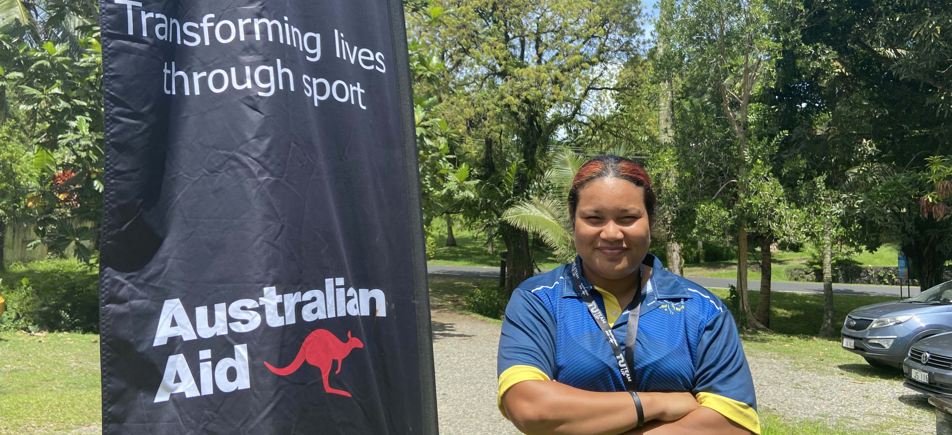 A female sports officer from Nauru smiling for a photo
