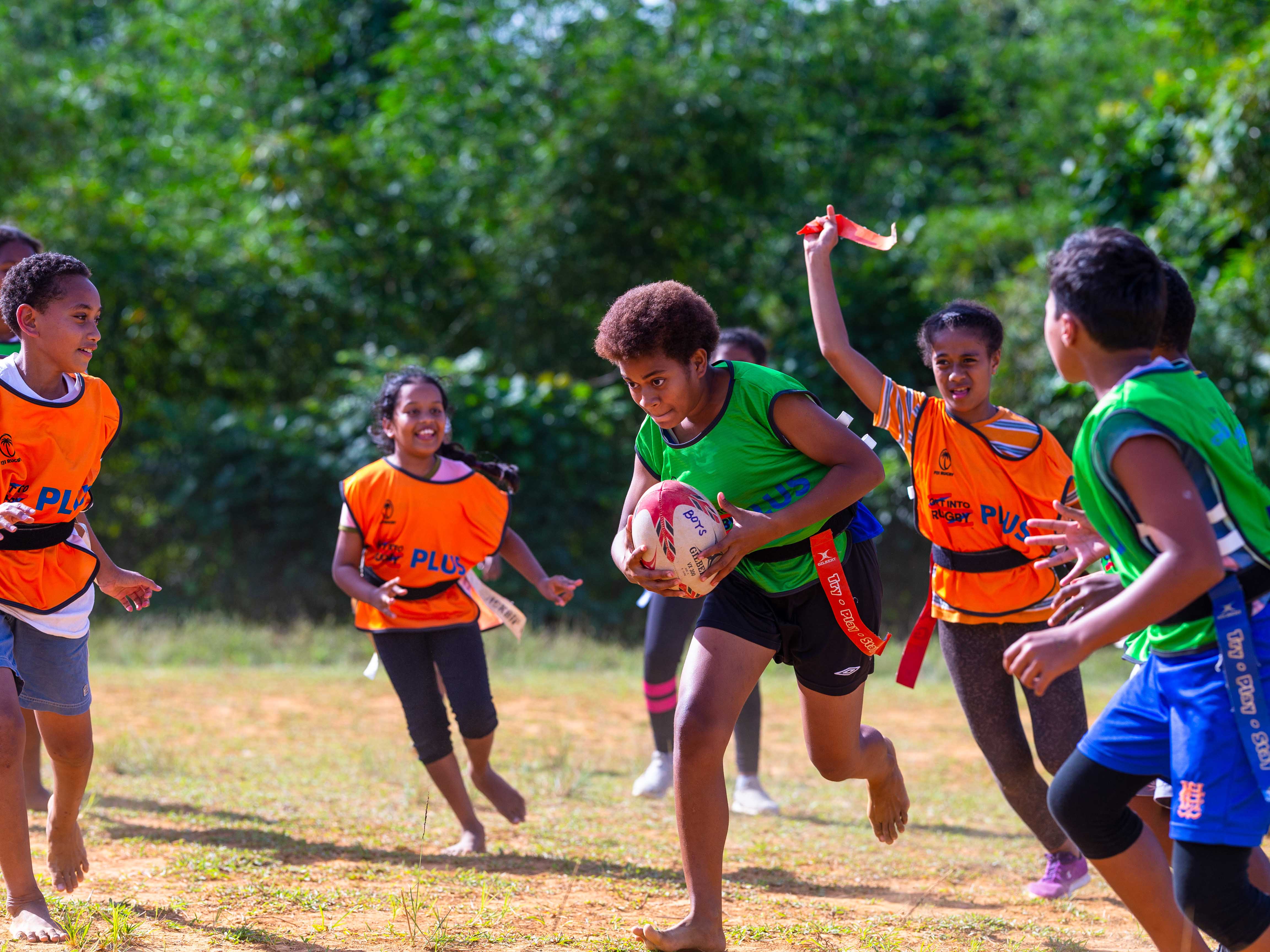 Girls in Fiji playing rugby union