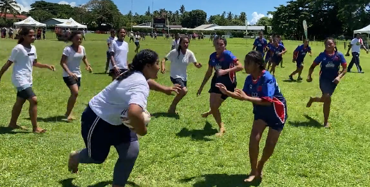 Girls in Samoa playing rugby league