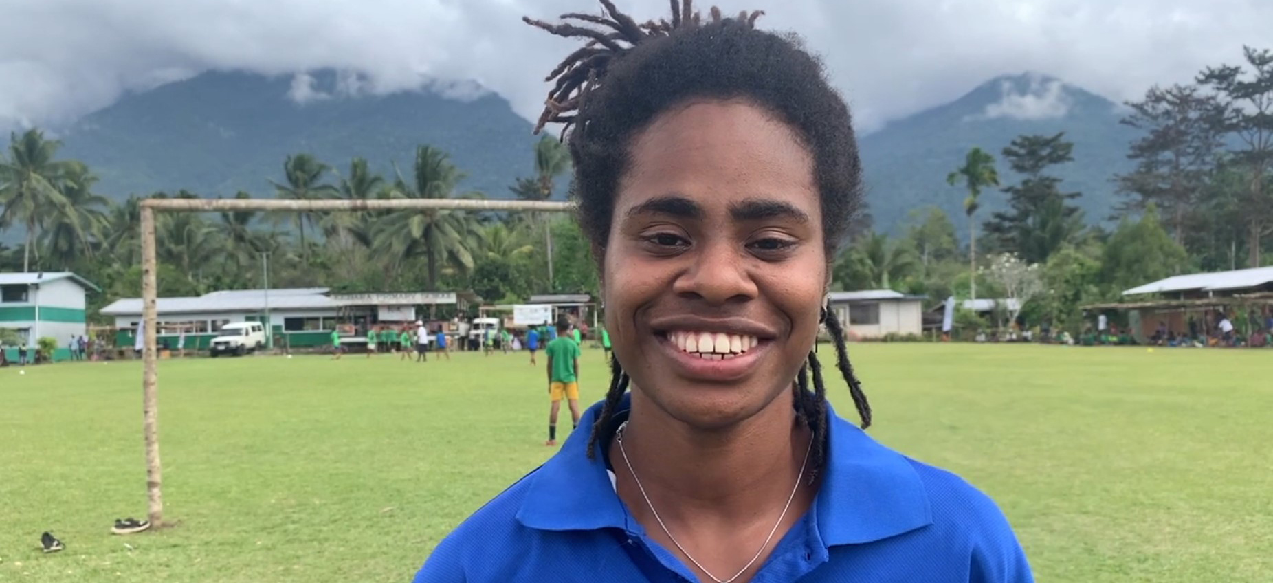 A woman delivering a sports program in Papua New Guinea