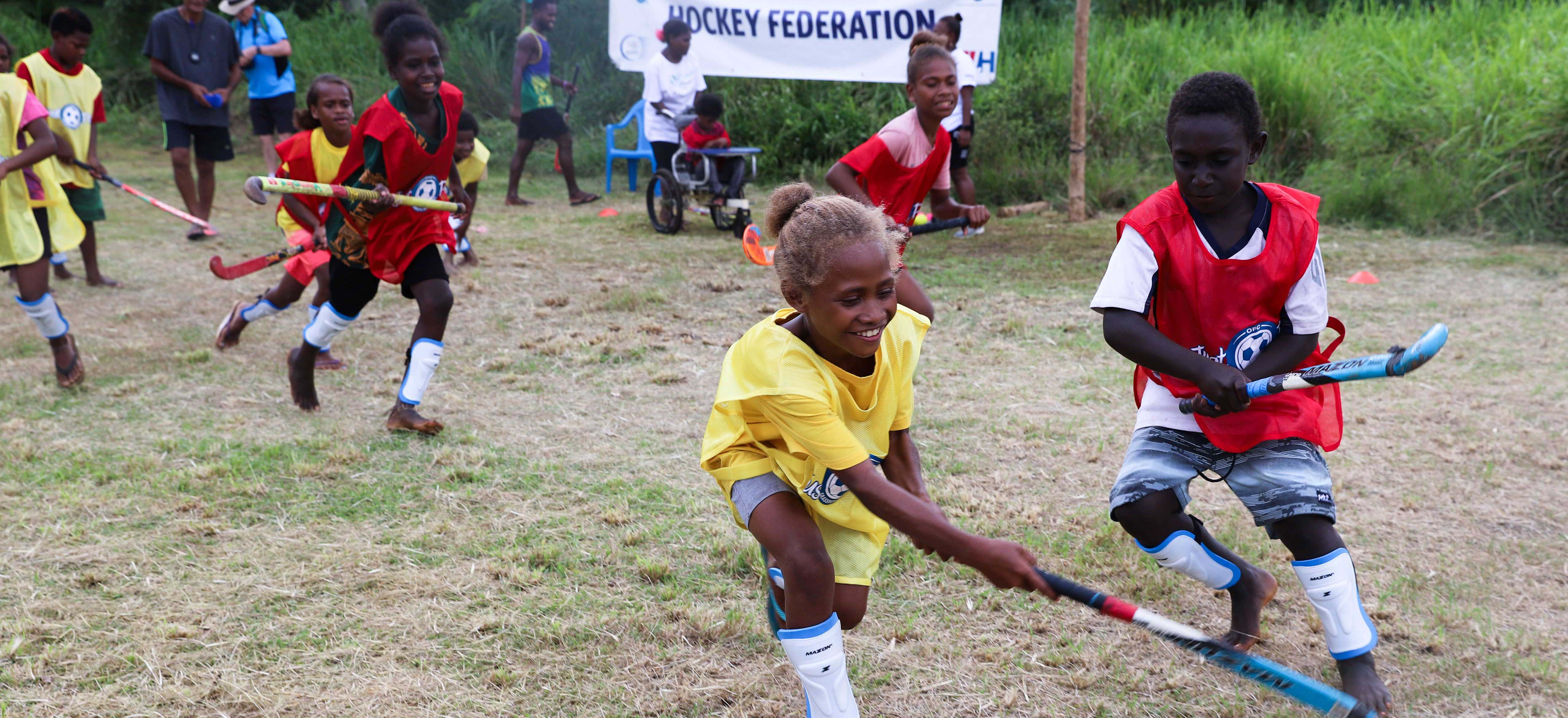 Children playing hockey