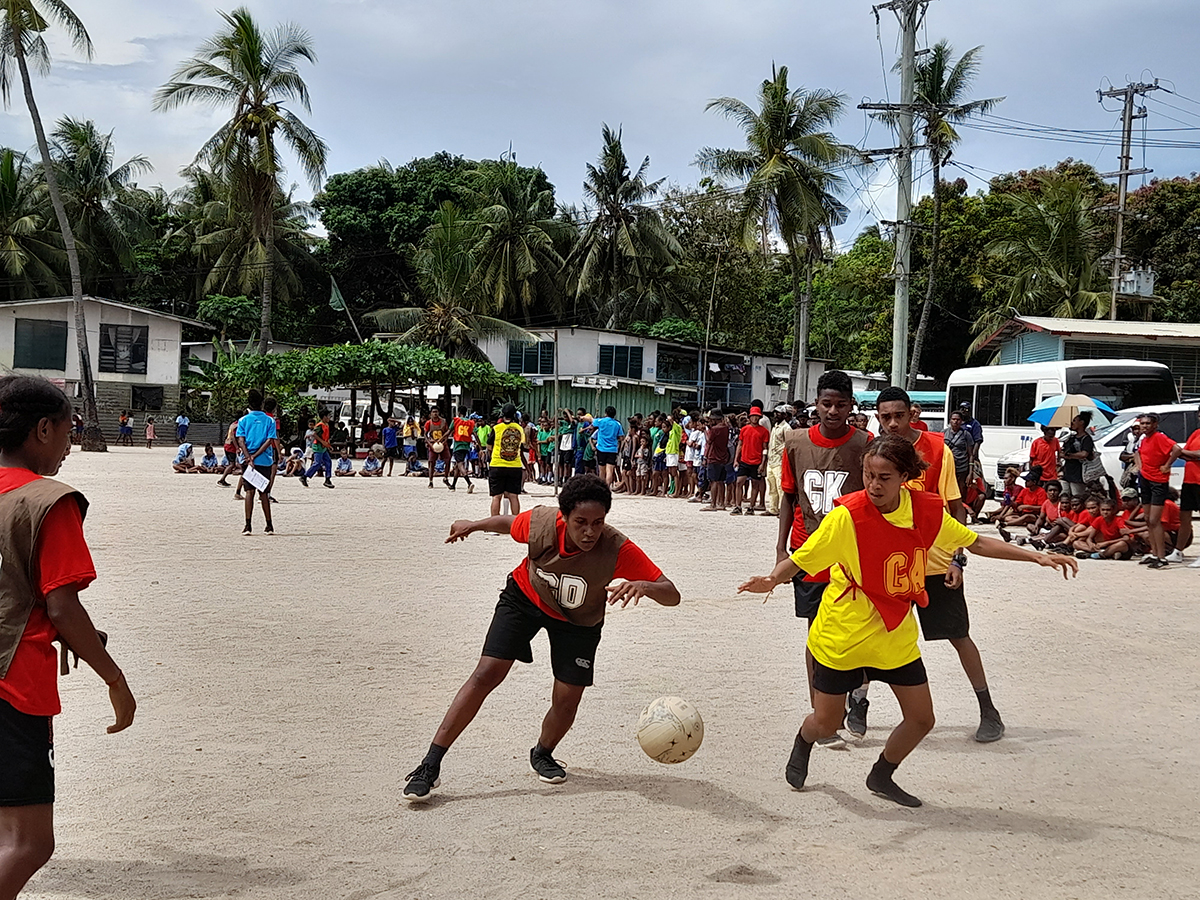 Young people playing netball 