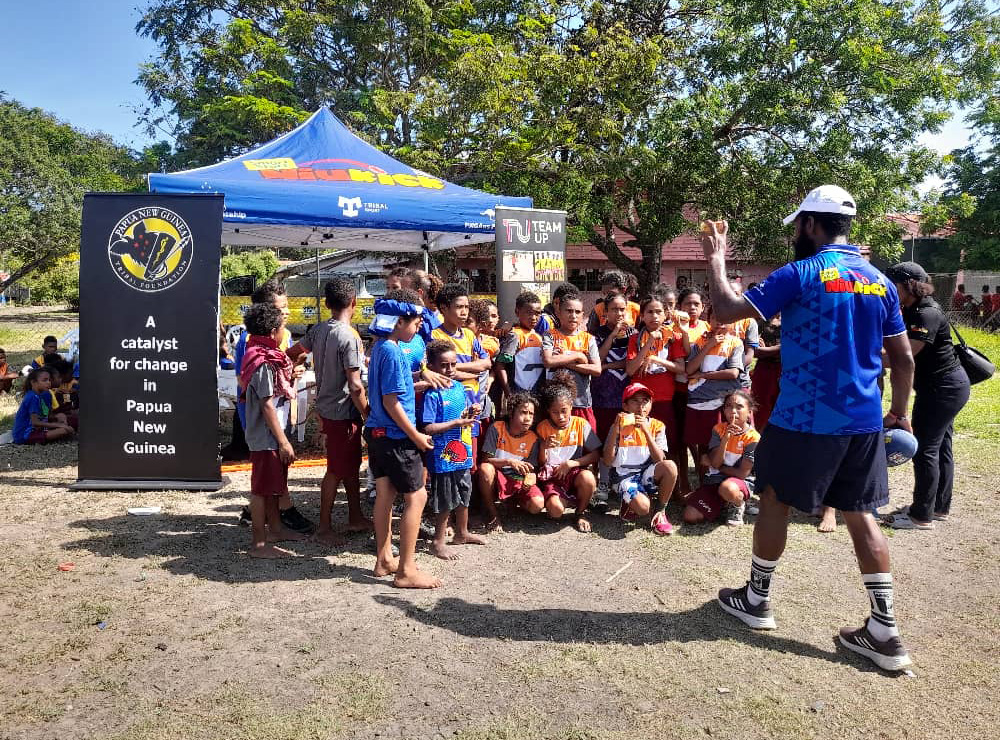 Children in Papua New Guinea at a sports education session 