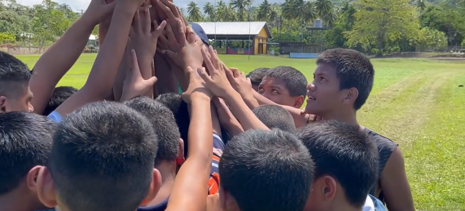 Children in Samoa holding hands