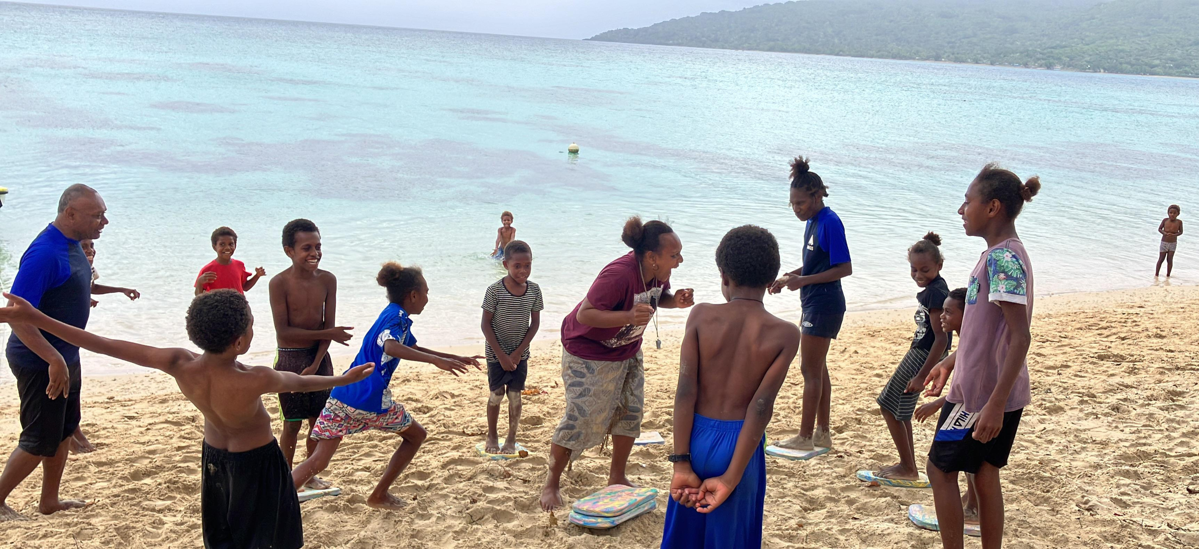 Children in Vanuatu take part in swimming lessons