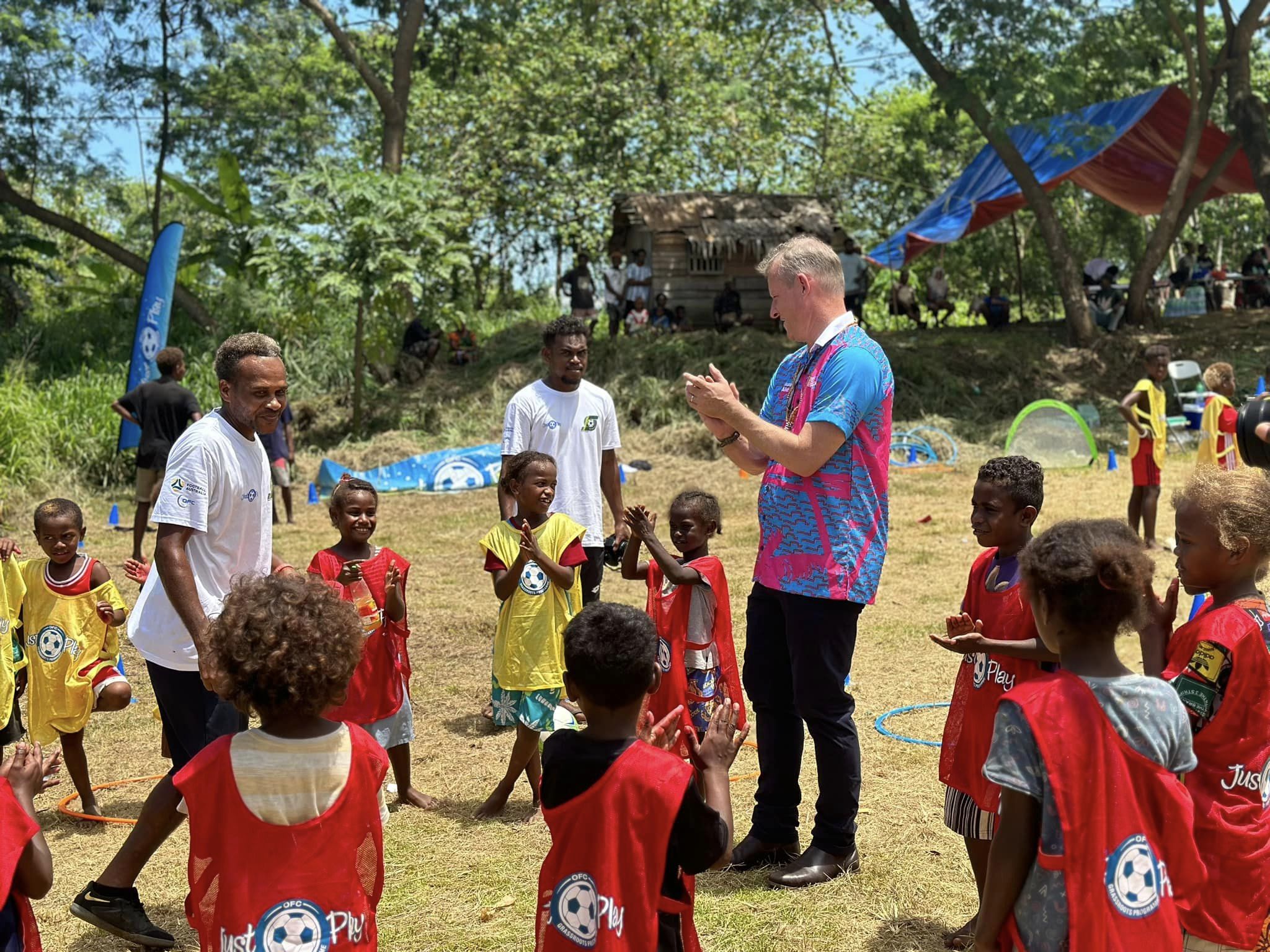 Children enjoying football