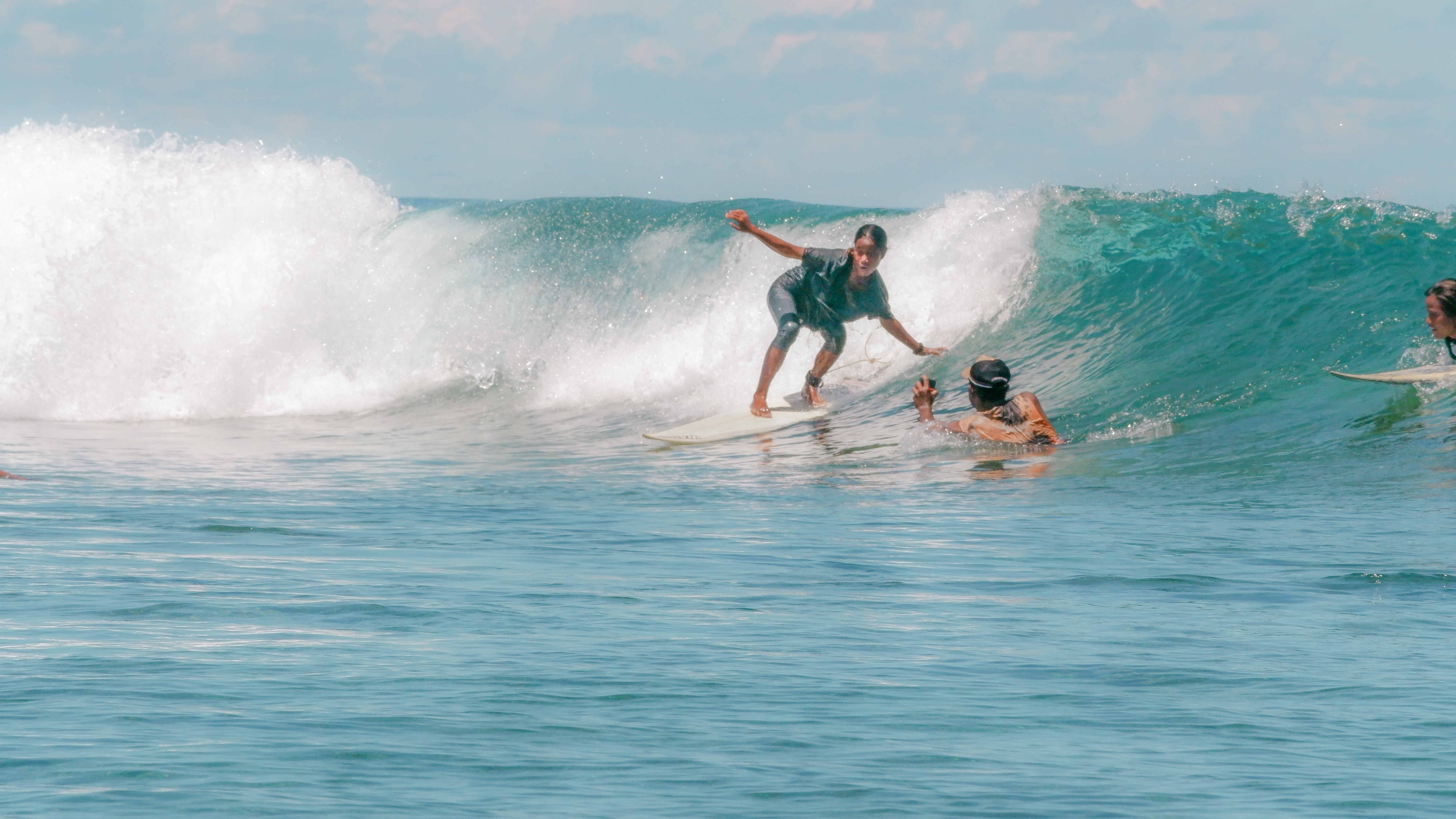 Young girl surfing 
