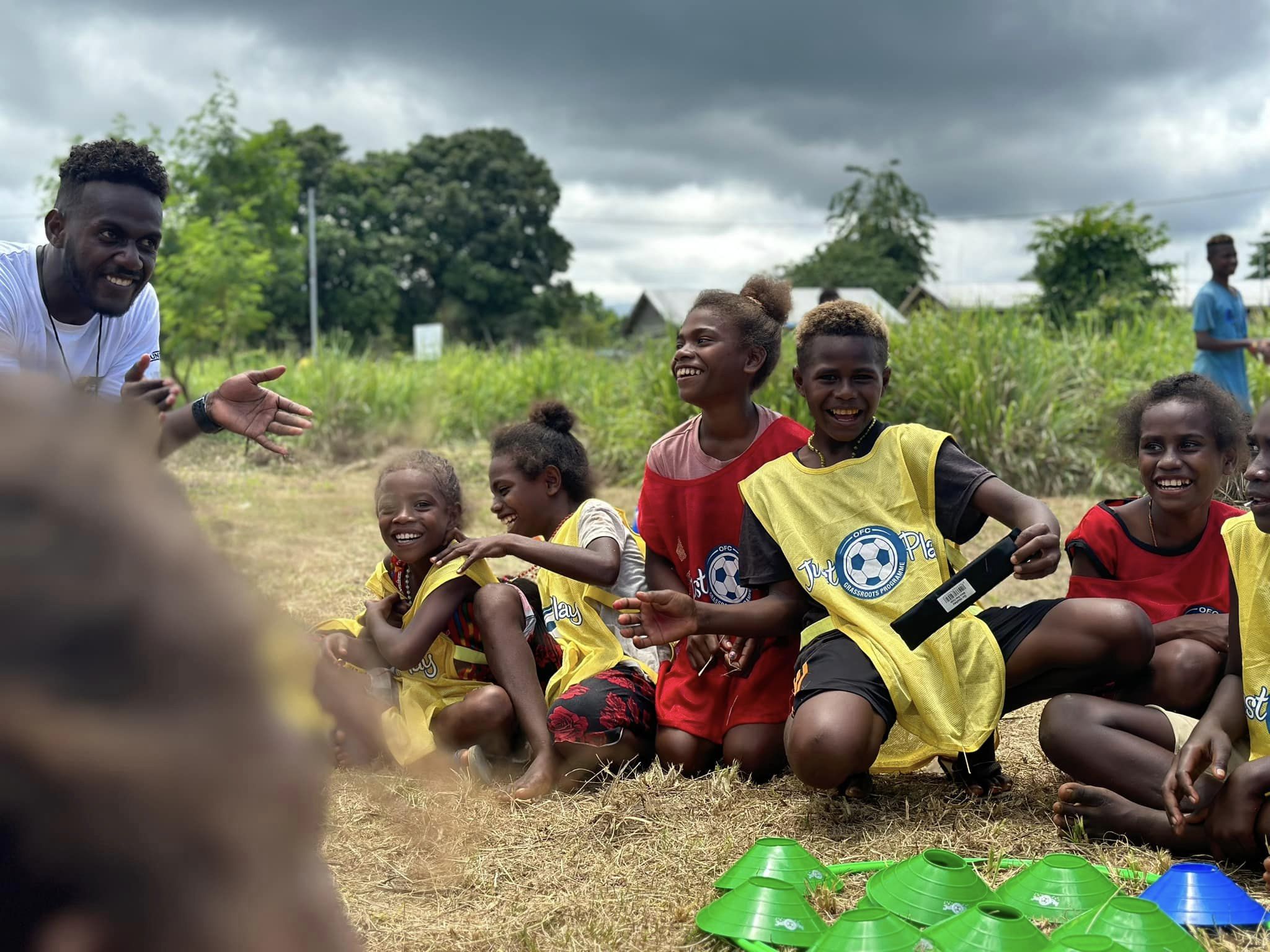 Children enjoying taking part in football