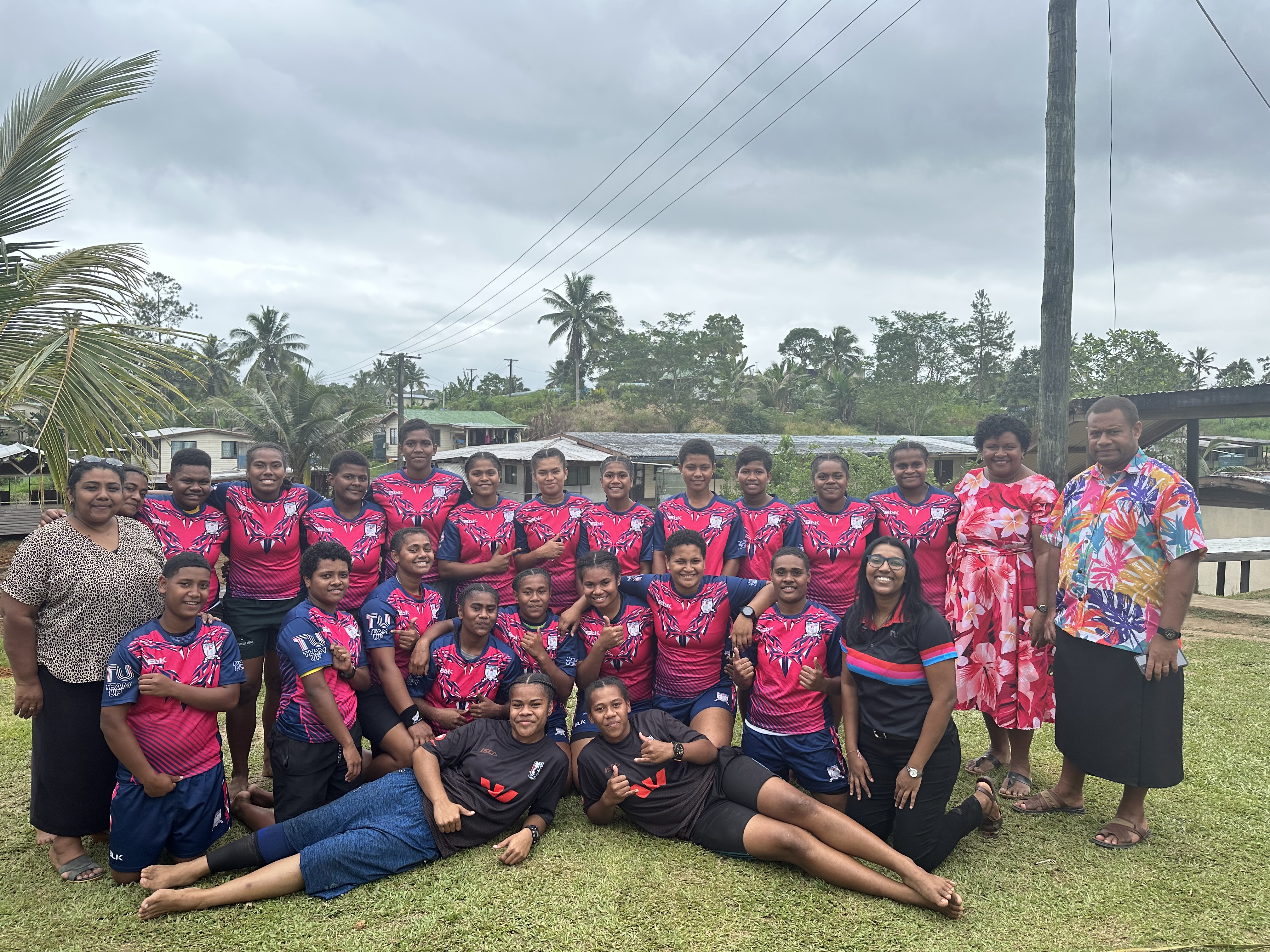 Group photo of an all-girls rugby league high school team