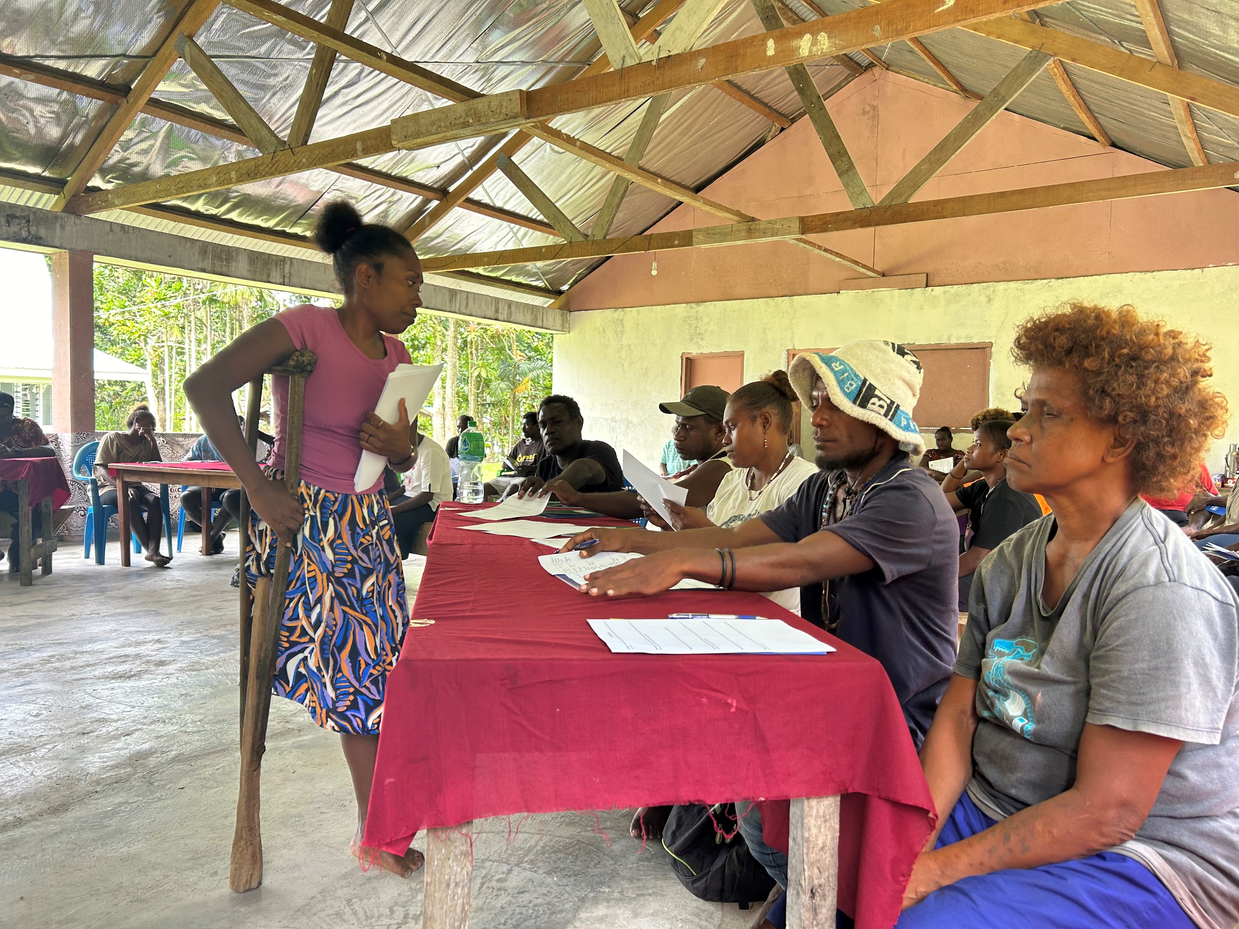 A woman with a disability seeks support in her community