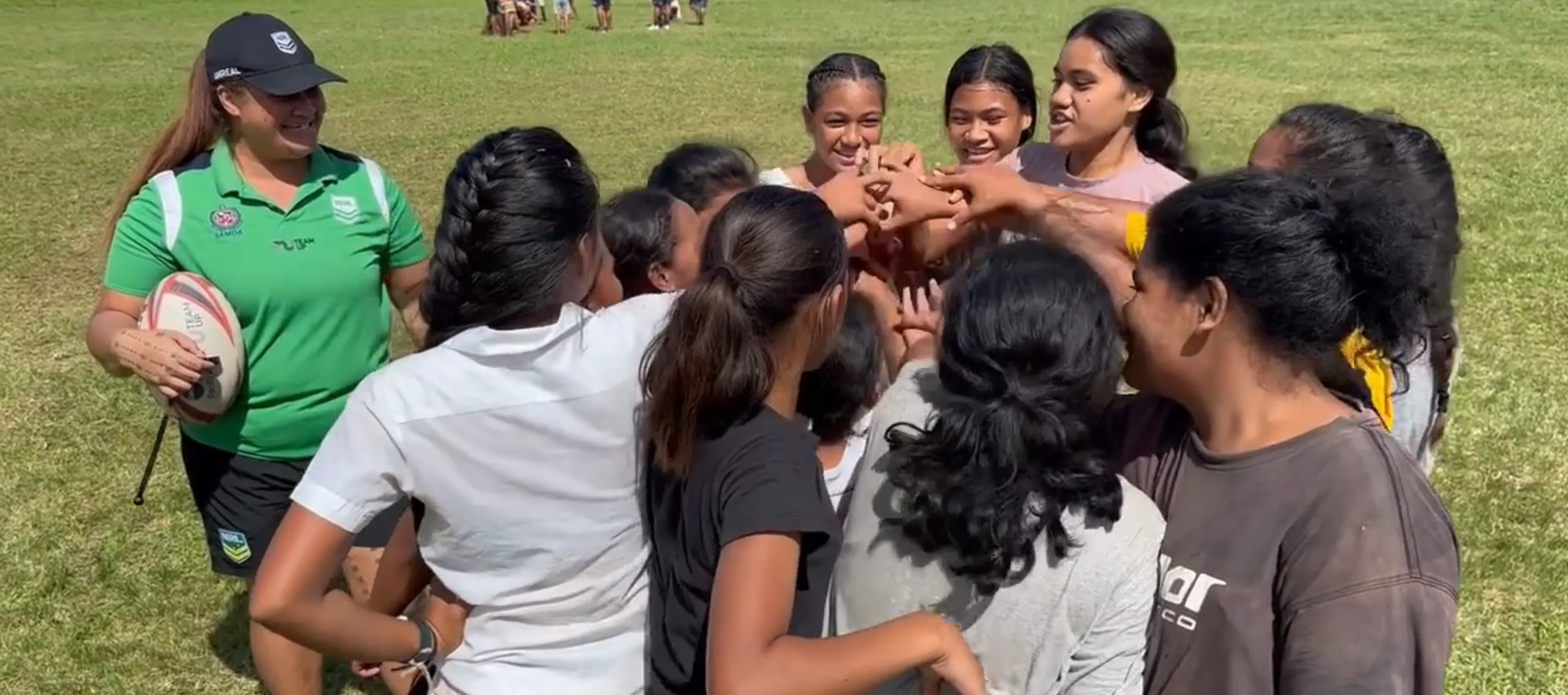 Girls playing rugby league