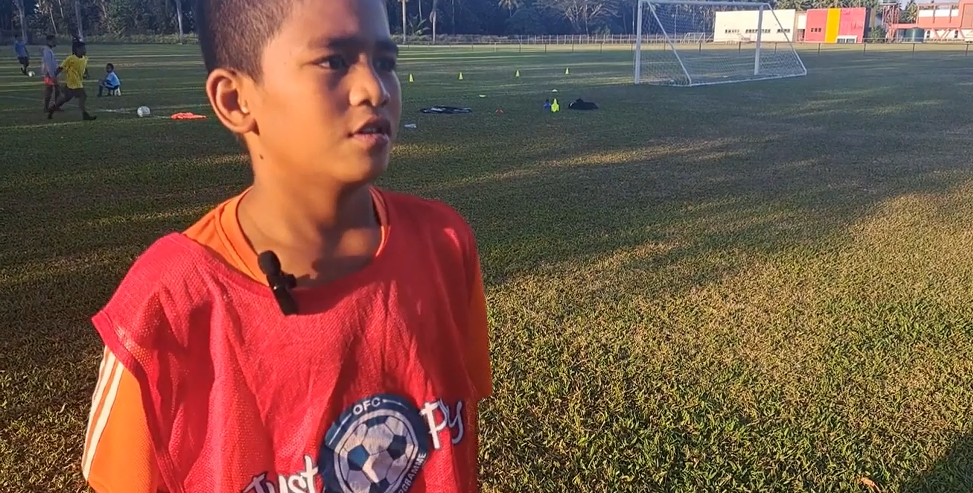 A boy is being interviewed