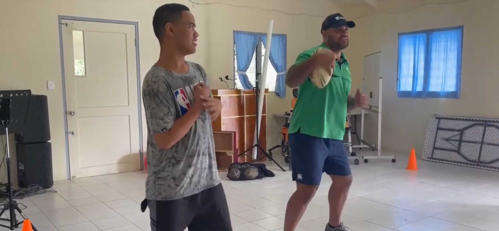 A man leads an inclusive rugby league activity