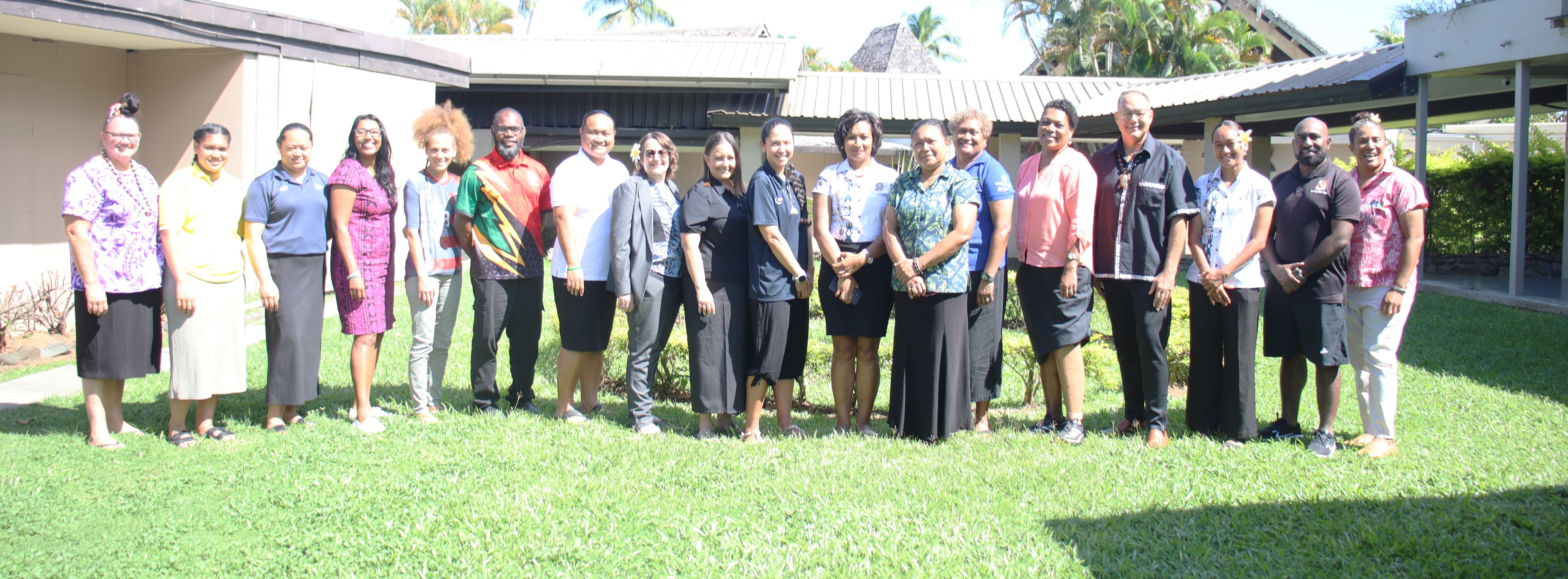 Workshop participants pose for a group photo 