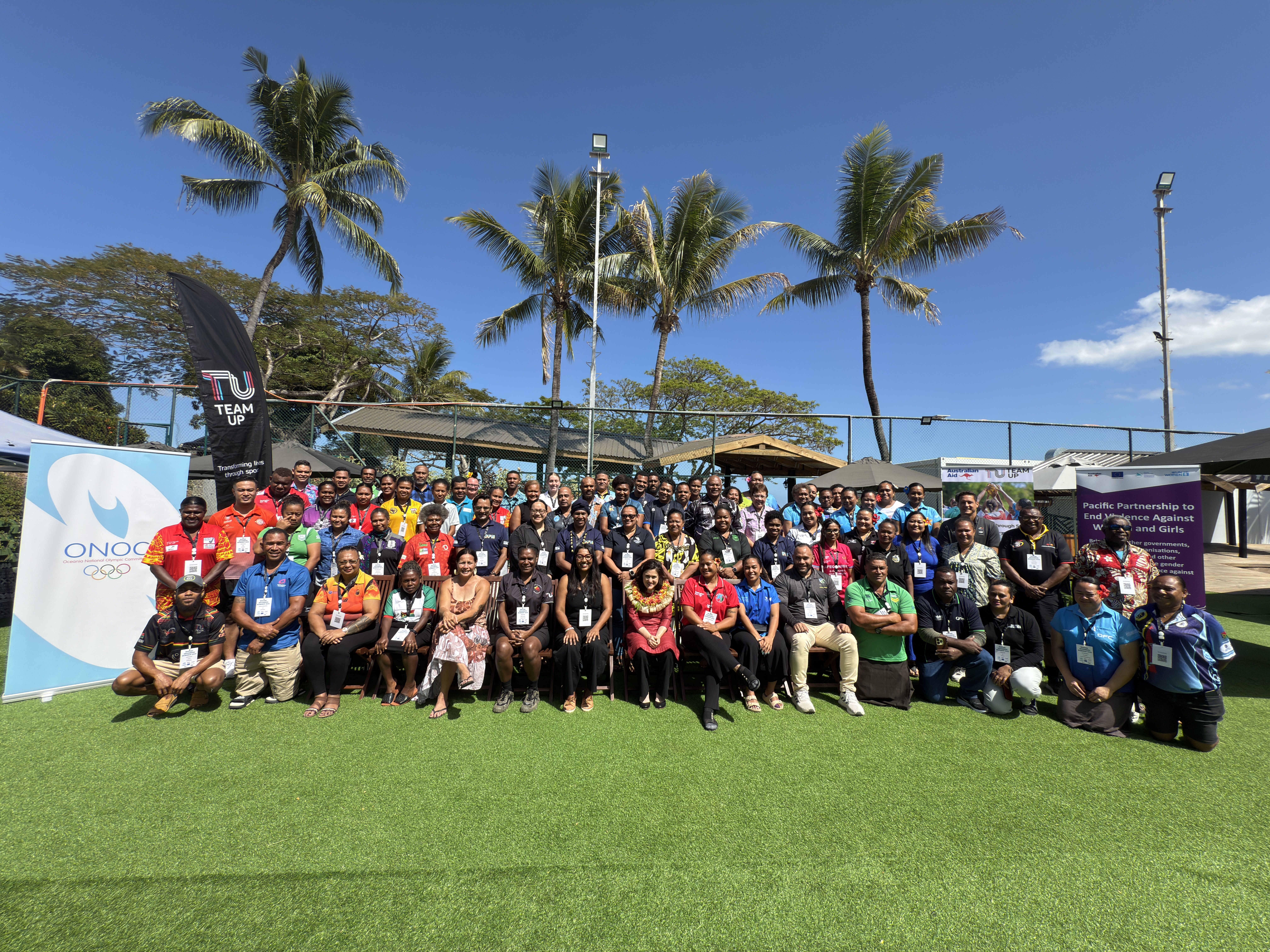 Group photo of over 80 workshop participants