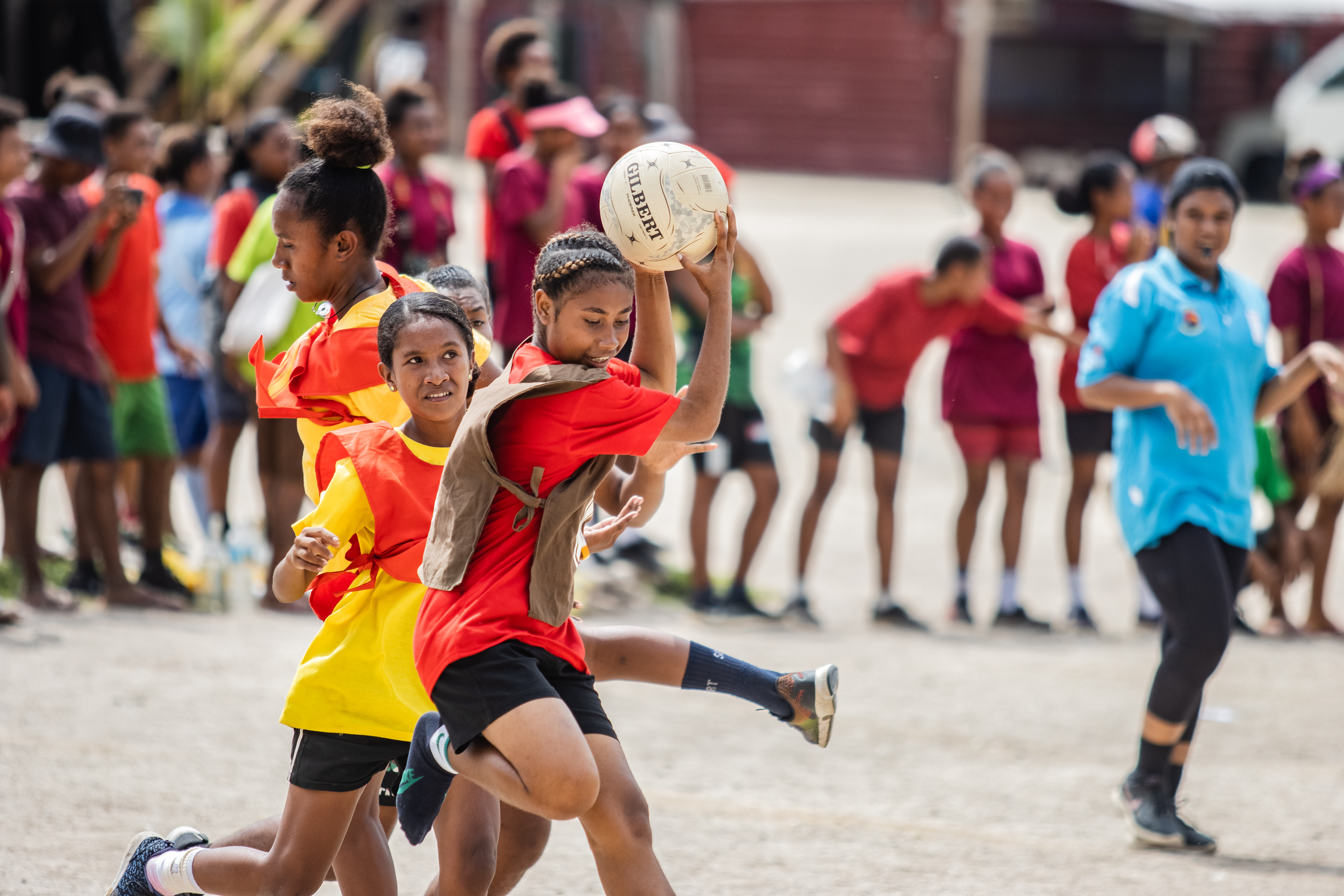 Young people playing netball 